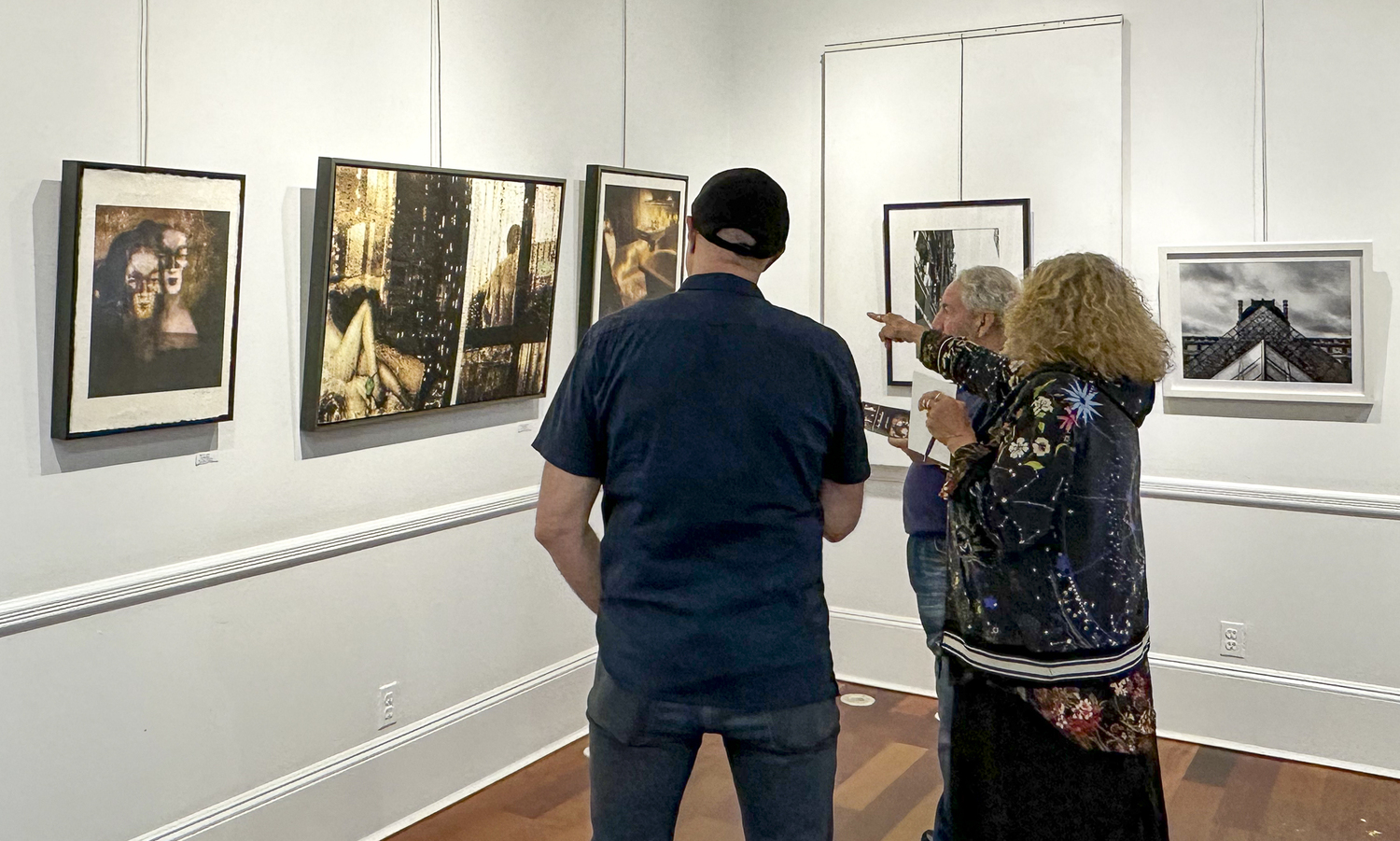 Guests at the opening of the East End Photographers Group Spring Photography Exhibition, which ran June 3 to 11 at Ashawagh Hall in East Hampton. COURTESY EEPG