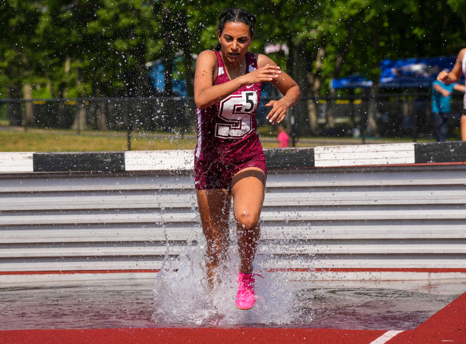 Southampton junior Jeorgiana Gavalas in the 2,000-meter steeplechase the state qualifier on Friday.   RON ESPOSITO