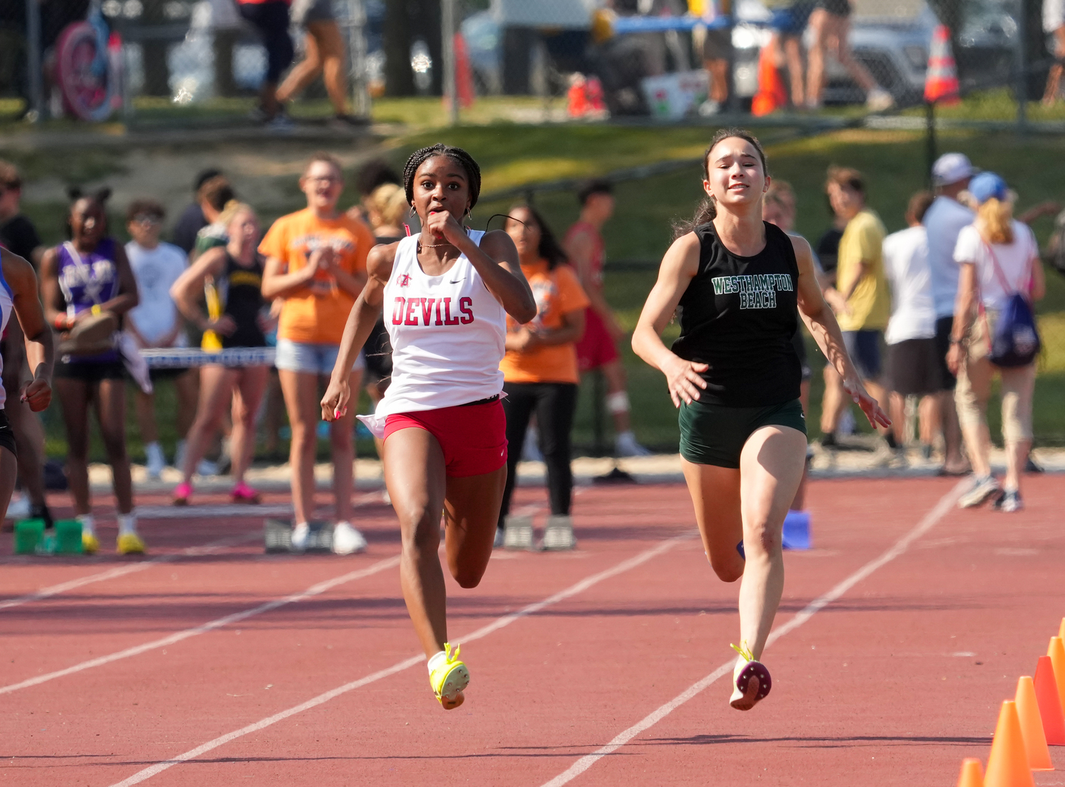 Westhampton Beach sophomore Halle Geller reached the finals of the 100-meter dash at the state qualifier.   RON ESPOSITO