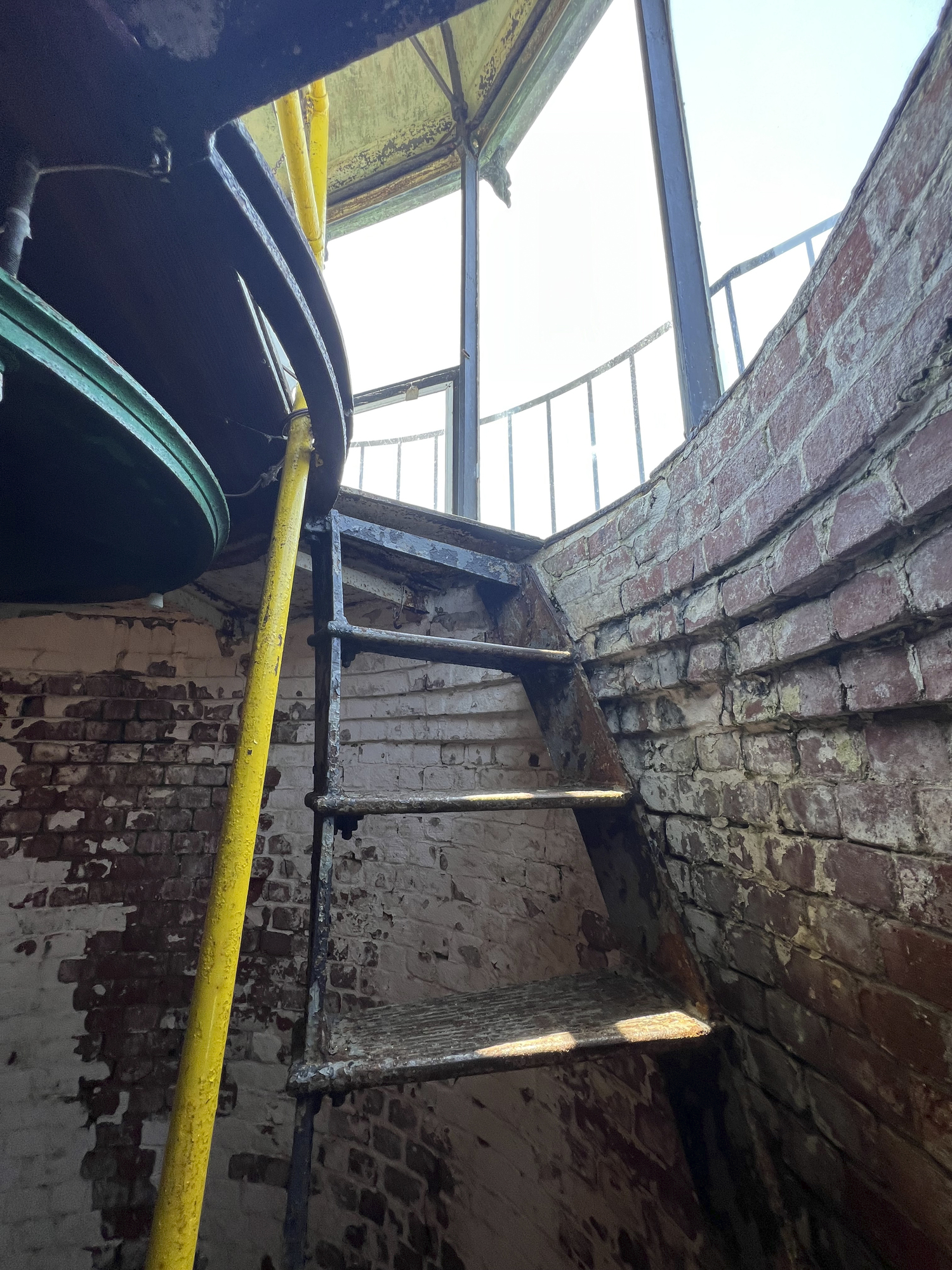 The final few, vertical steps leading up to the lantern at the Horton Point Lighthouse.  DANA SHAW