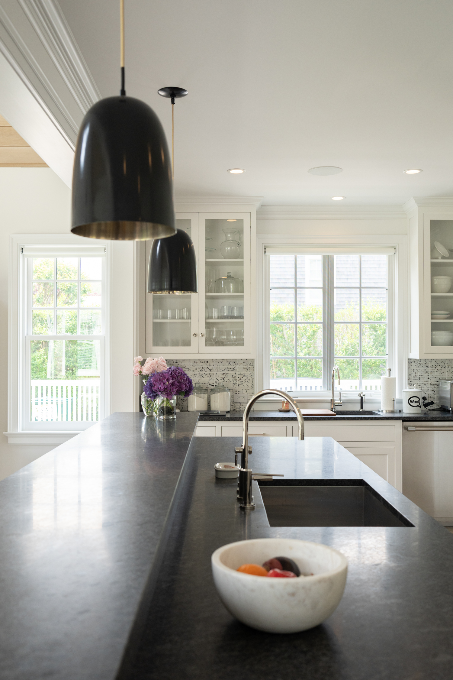 A two-tiered kitchen island is everyone’s favorite hangout place. LORI HAWKINS