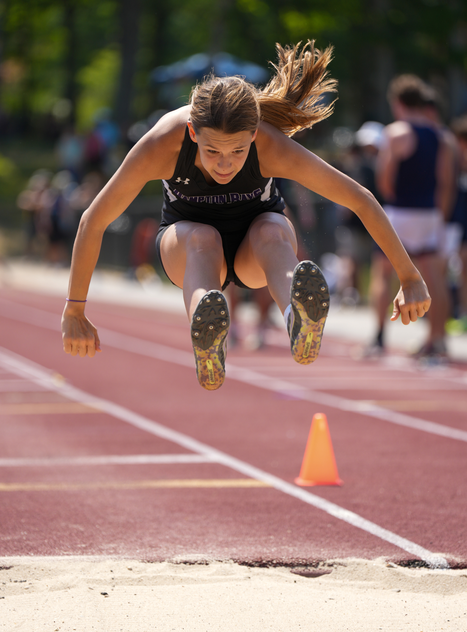 Hampton Bays junior Allie O'Brien in the long jump portion of the pentathlon.   RON ESPOSITO