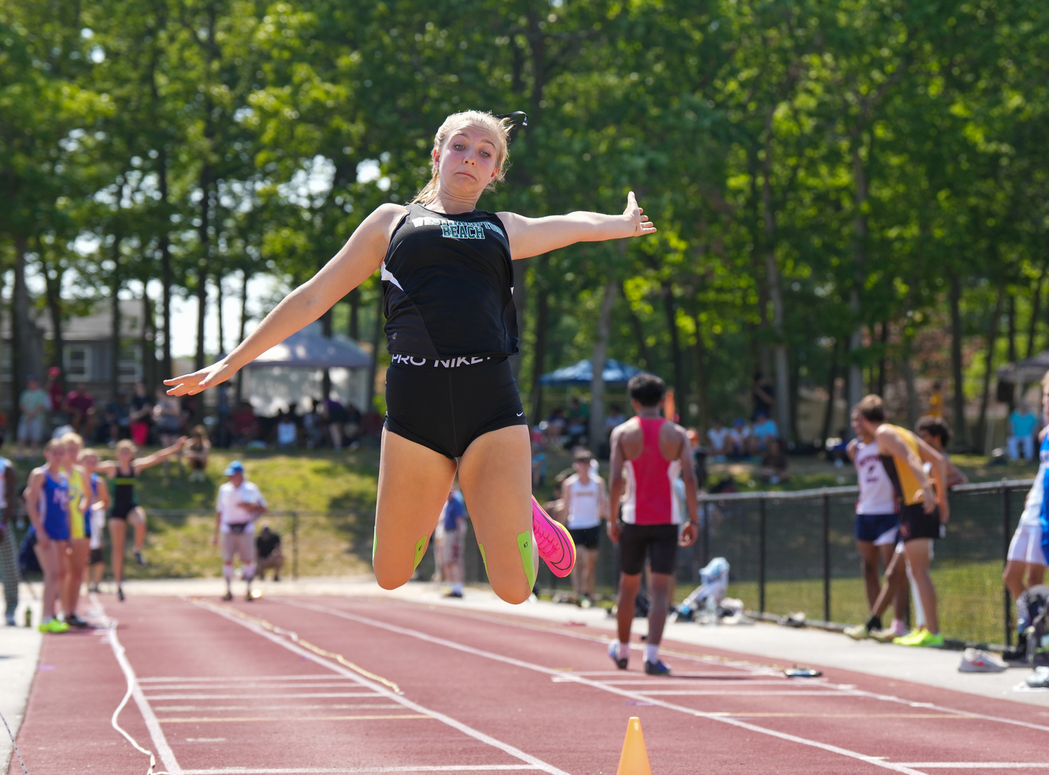 Westhampton Beach junior Madison Phillips in the long jump of the pentathlon.   RON ESPOSITO