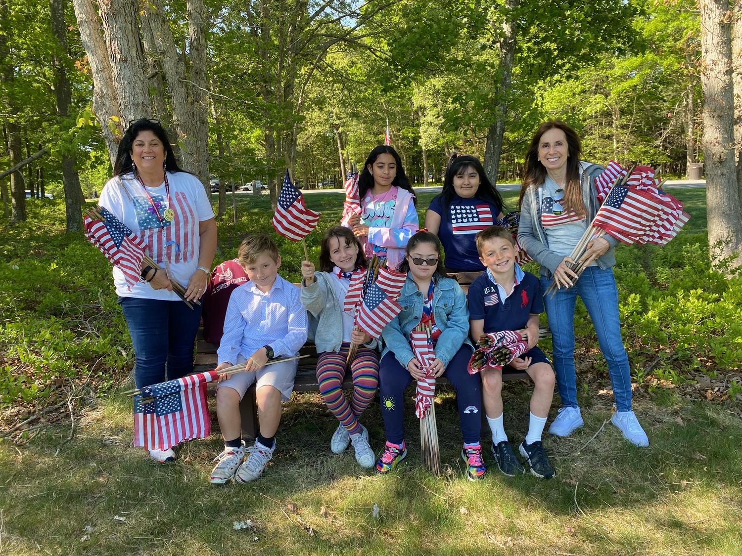 Southampton Elementary School Student Council members honored members of the military and their families by placing flags on their graves for Memorial Day. It was a transformational experience for the students to see the difference before and after the placement of the flags. As they placed the flags, the students said the name of the person at each gravesite and thanked them for their service. Advisers Lisa Carew and Annemarie Calogrias said they are very proud of the students for their service to the community and school throughout the year. COURTESY SOUTHAMPTON SCHOOL DISTRICT