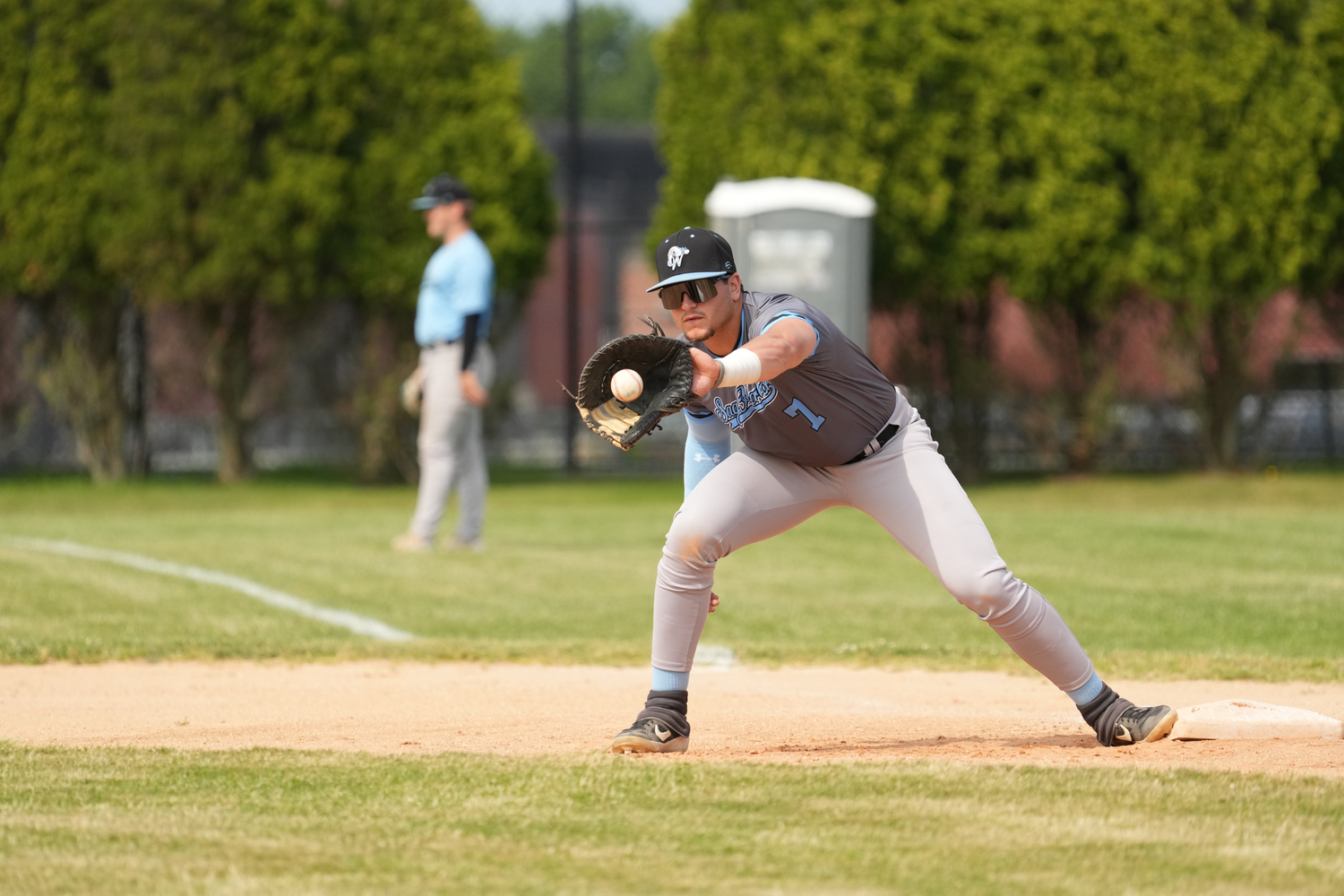 Sag Harbor's Josh Parks stretches at first base. RON ESPOSITO