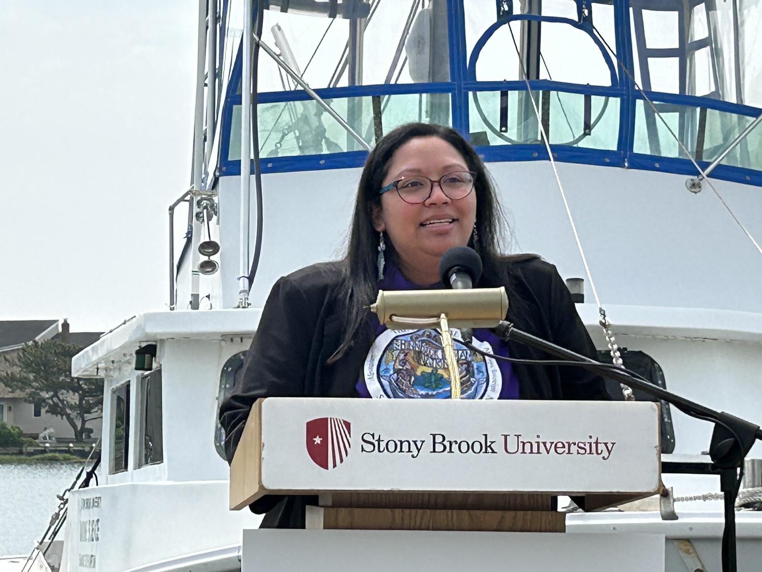 Dr. Kelsey Leonard of the Shinnecock Nation spoke of the the importance of Shinnecock Bay to her people.   KITTY MERRILL