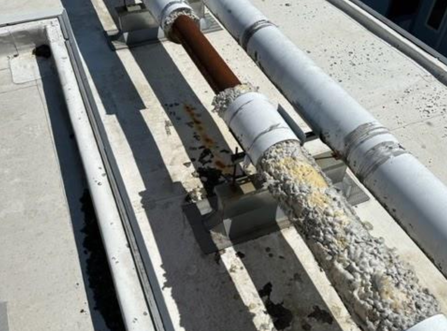 Exterior chiller piping insulation at East Hampton Middle School has decayed over time. EAST HAMPTON SCHOOL DISTRICT