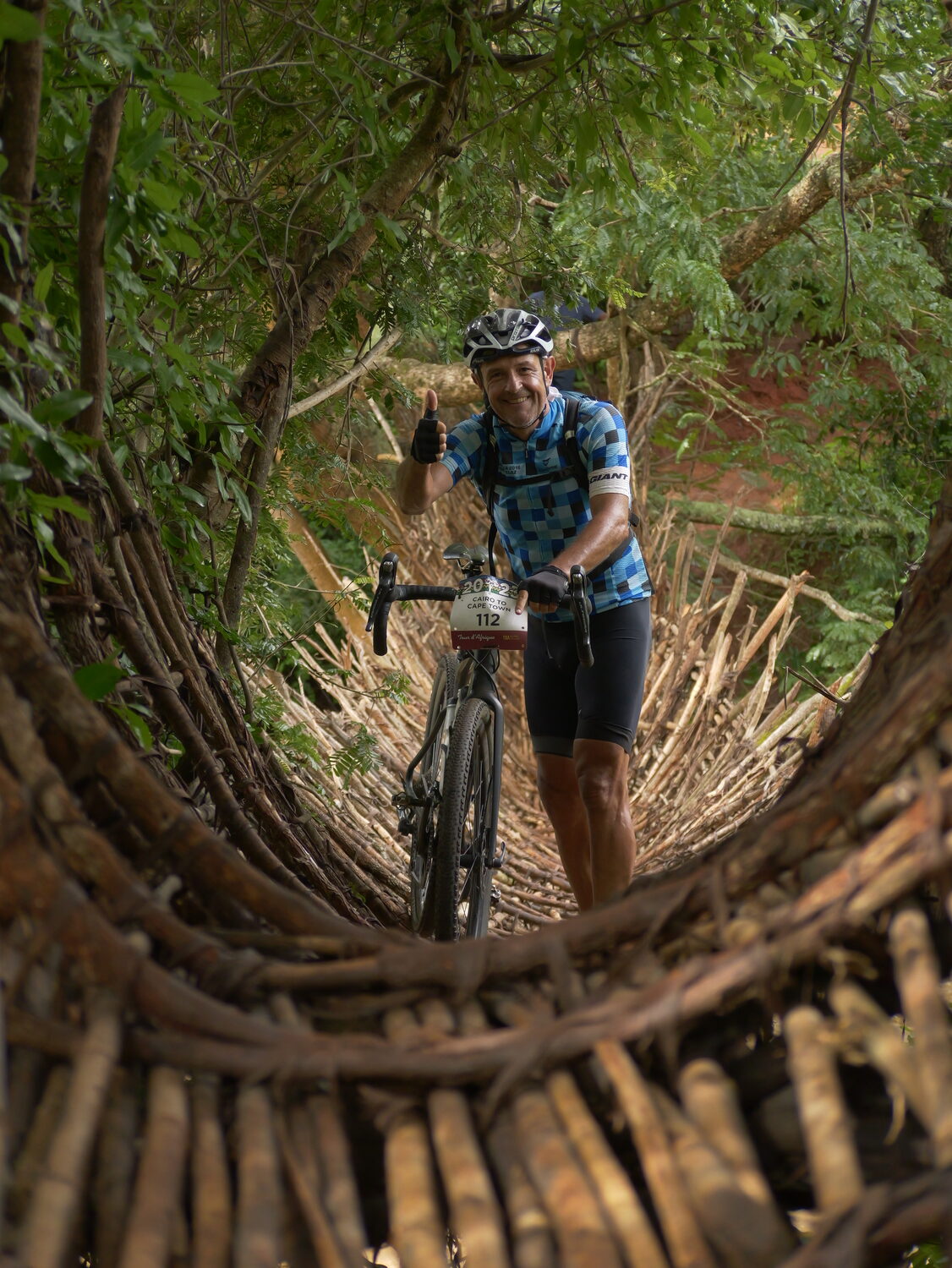 A bridge of vine and rope near Mzuzu, Malawi. COURTESY JOE LOUCHHEIM