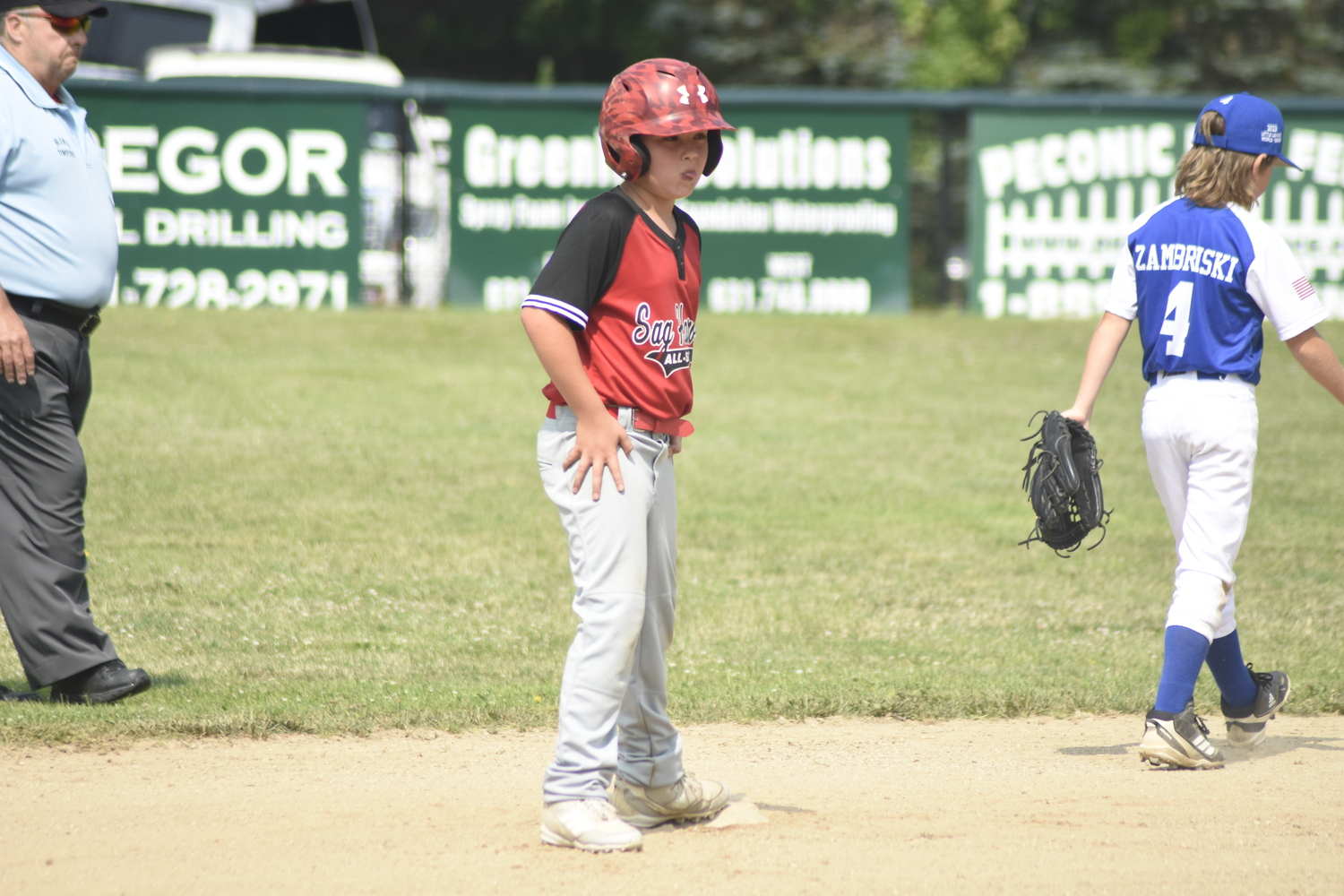 Jace Birdsall reaches second base.   DREW BUDD