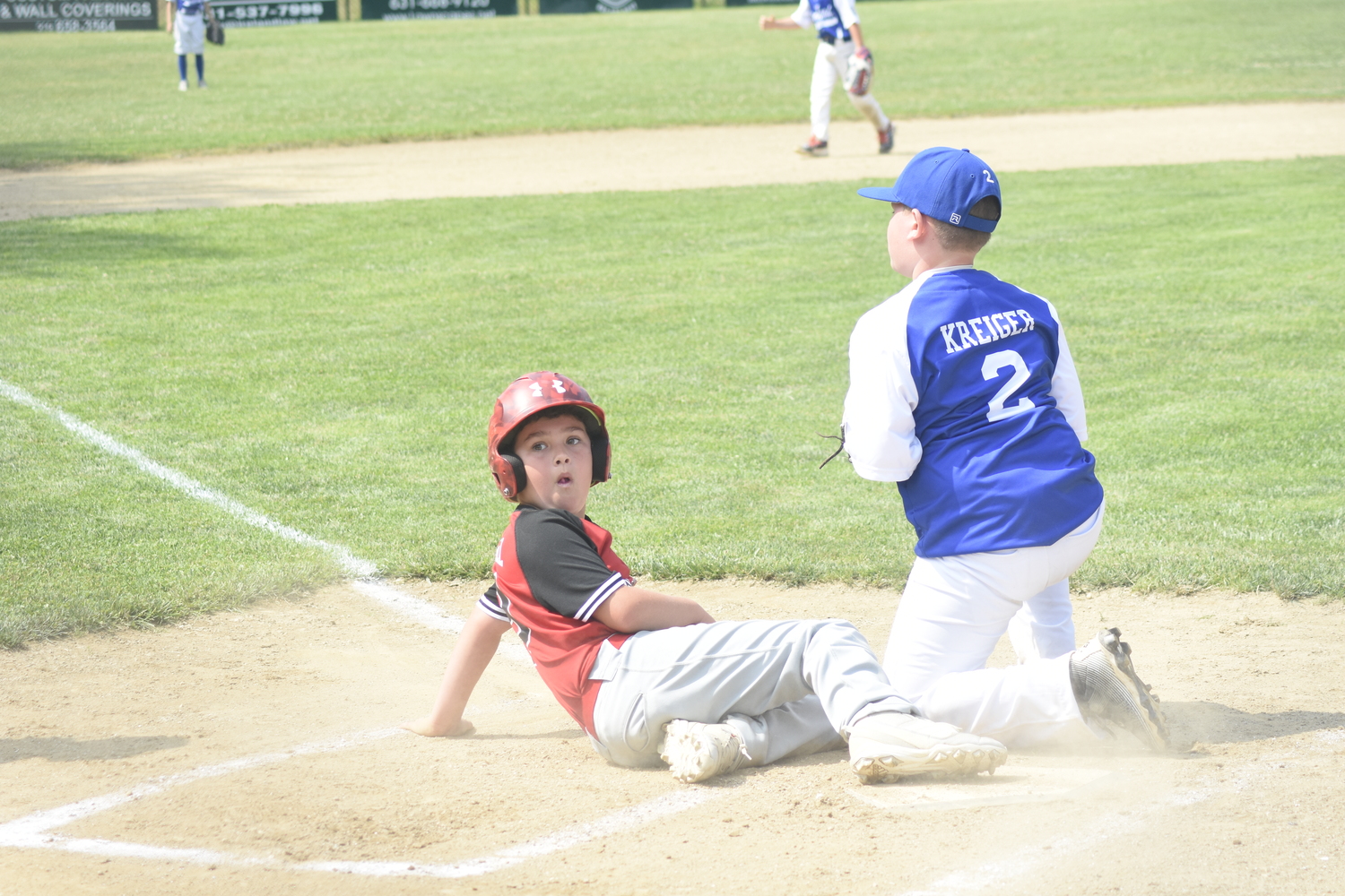 Jace Birdsall looks back for the umpire's out call.   DREW BUDD