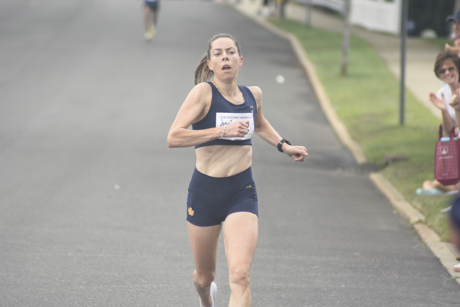 Aileen Barry was the female champion and rounded out the top five of this year's Joe Koziarz Memorial 5K on Saturday.   DREW BUDD