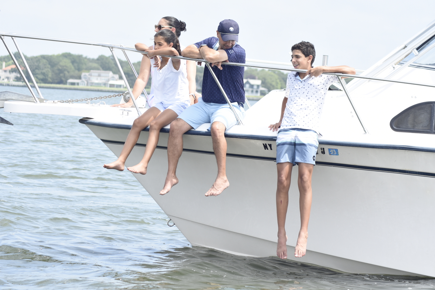 Onlookers take in some sailing.  DREW BUDD