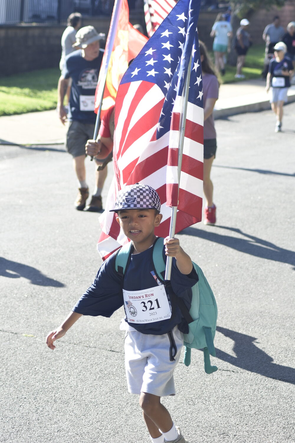 Flynt Zoleta, 8, of Floral Park at the onset of Sunday's race.   DREW BUDD