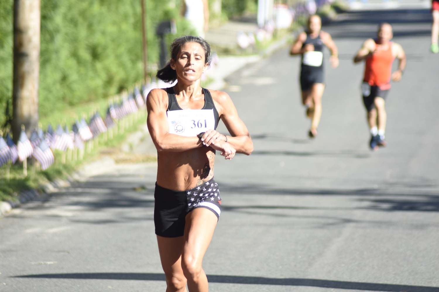 Tara Farrell, 44, of East Quogue finished second among women.  DREW BUDD