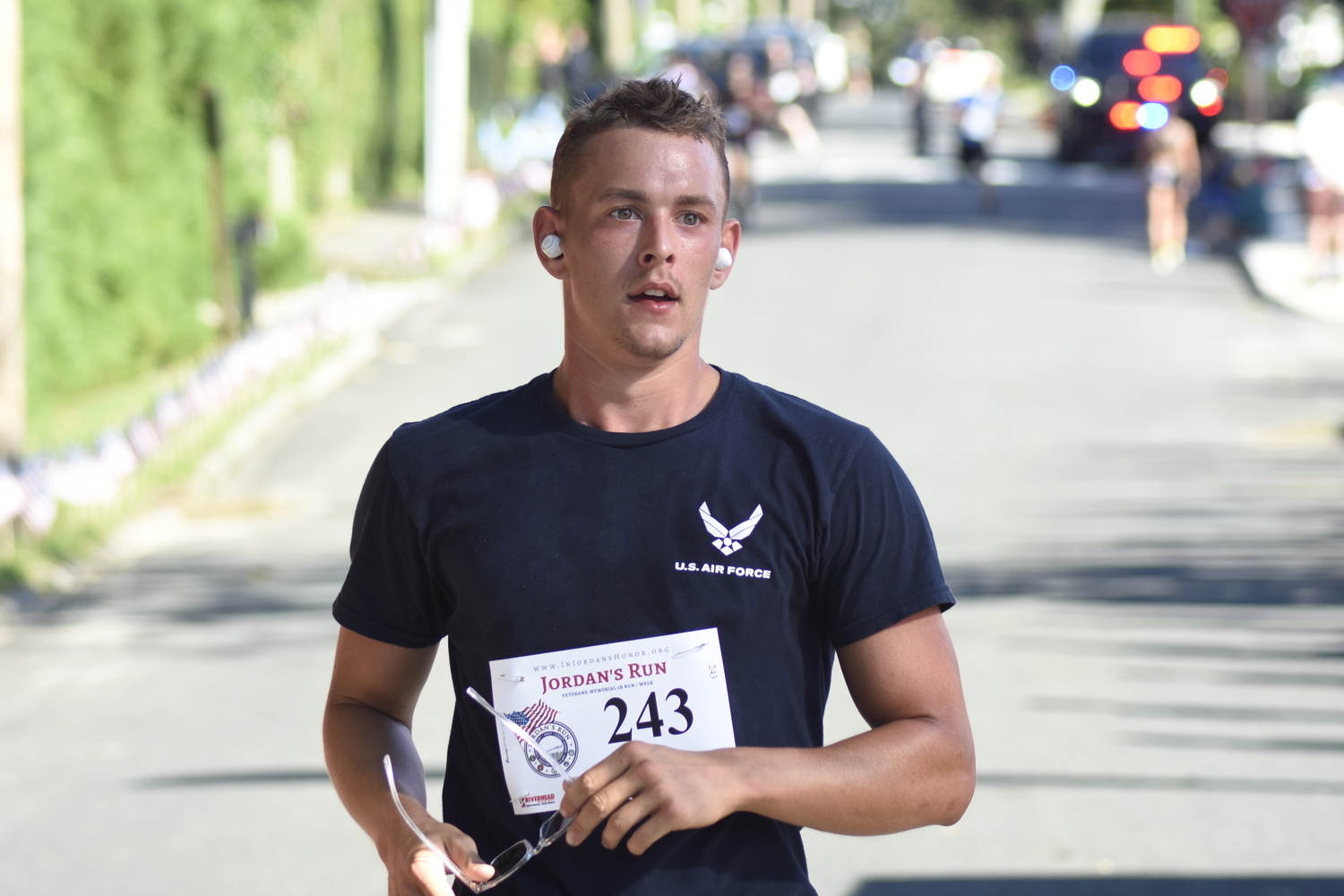 Gavin Gilbride, the recent Pierson High School graduate and Jordan Haerter Scholarship reciptient, crosses the finish line. Gilbride leaves for the Air Force this month.   DREW BUDD