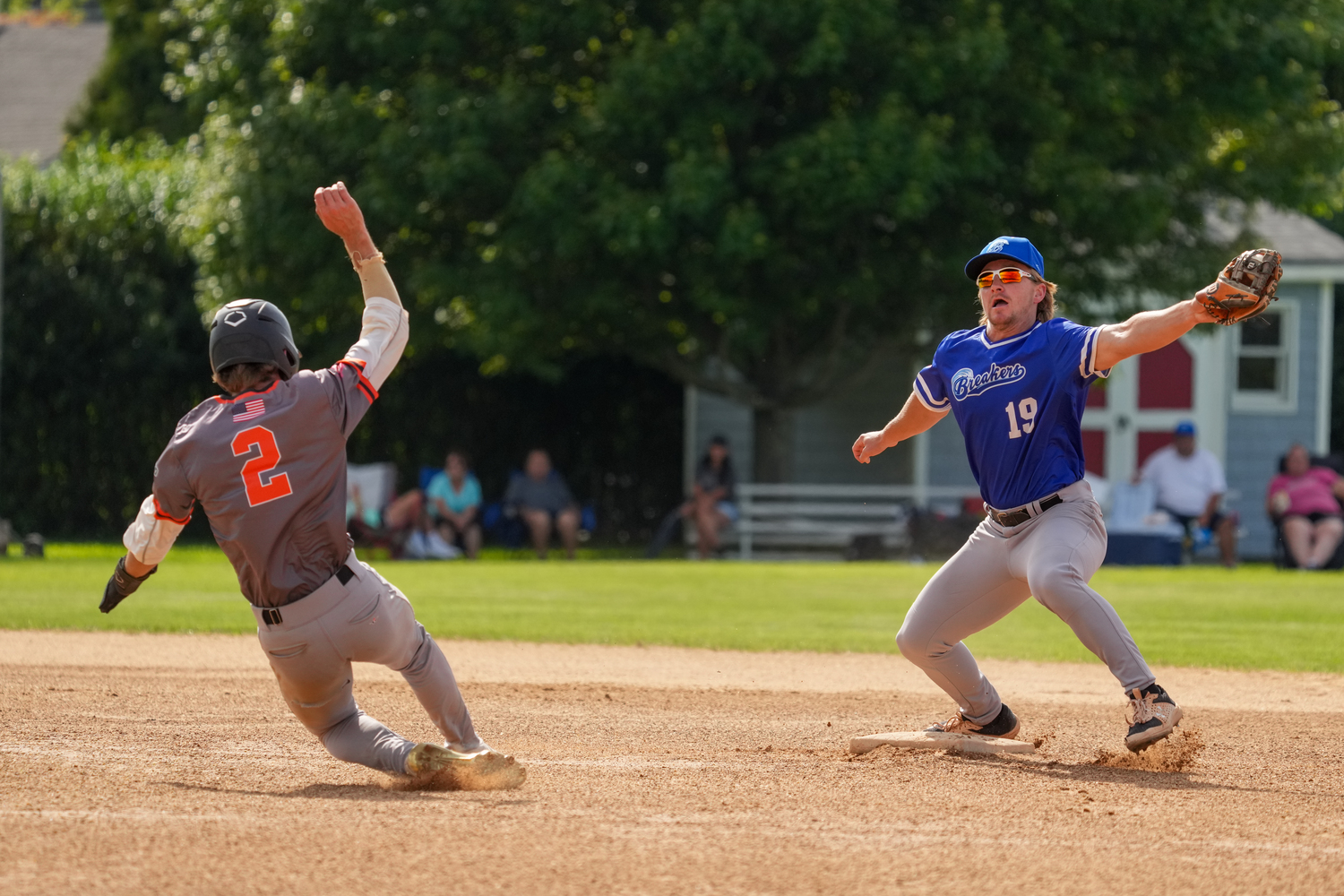 Southampton's Chad Pike (Oklahoma City) takes a slightly wide throw and tags out Shelter Island's Conor Kiely (Stonehill) at second base.   RON ESPOSITO