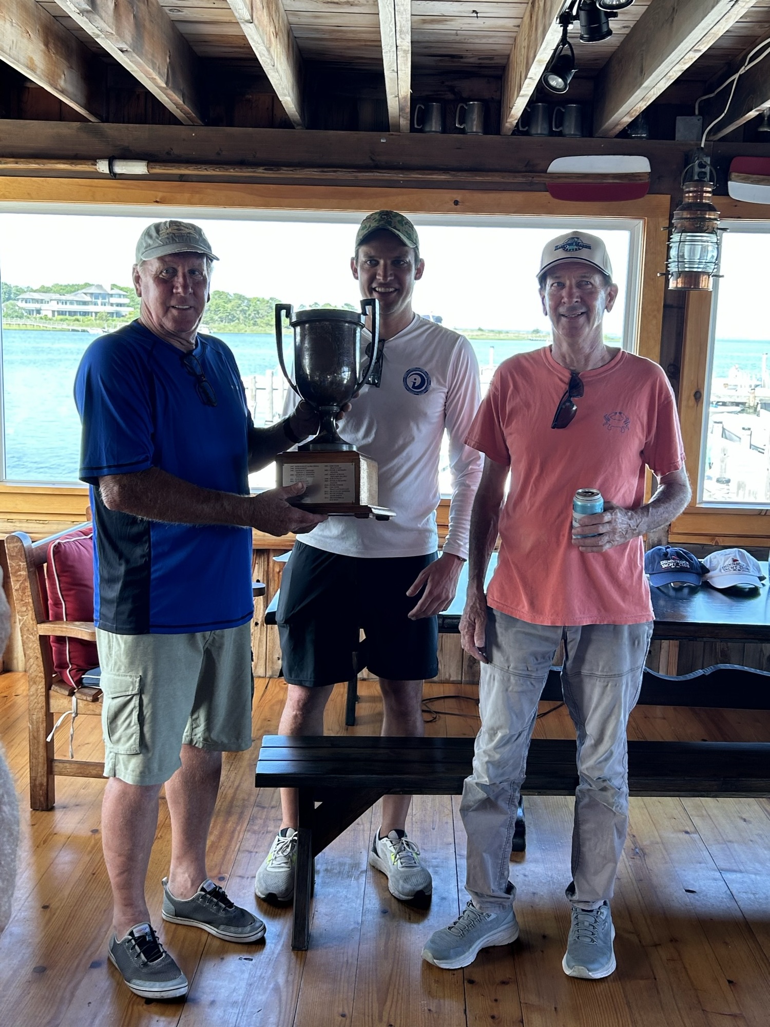Frank Scopinich, left, Ian Connett and Michael Boone.  Scopinich and Boone won this year's Smith Point Trophy.