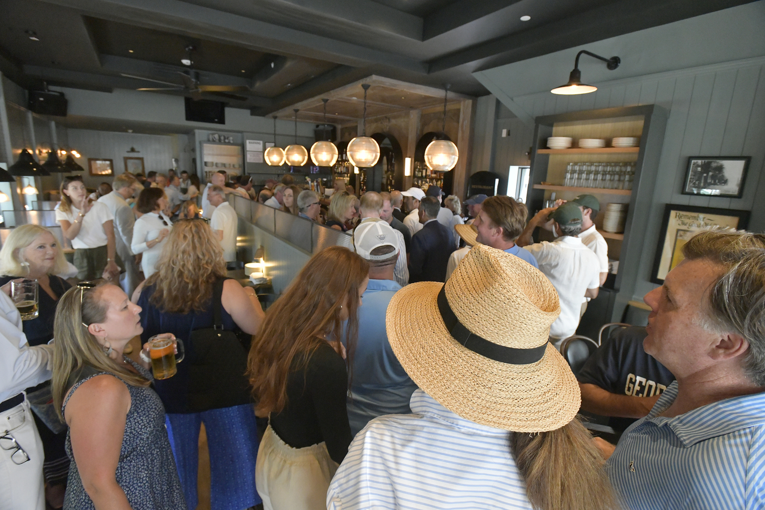 Friends and well wishers packed Shippy's restaurant in Southampton Village on July 3 after the ribbon cutting.   DANA SHAW