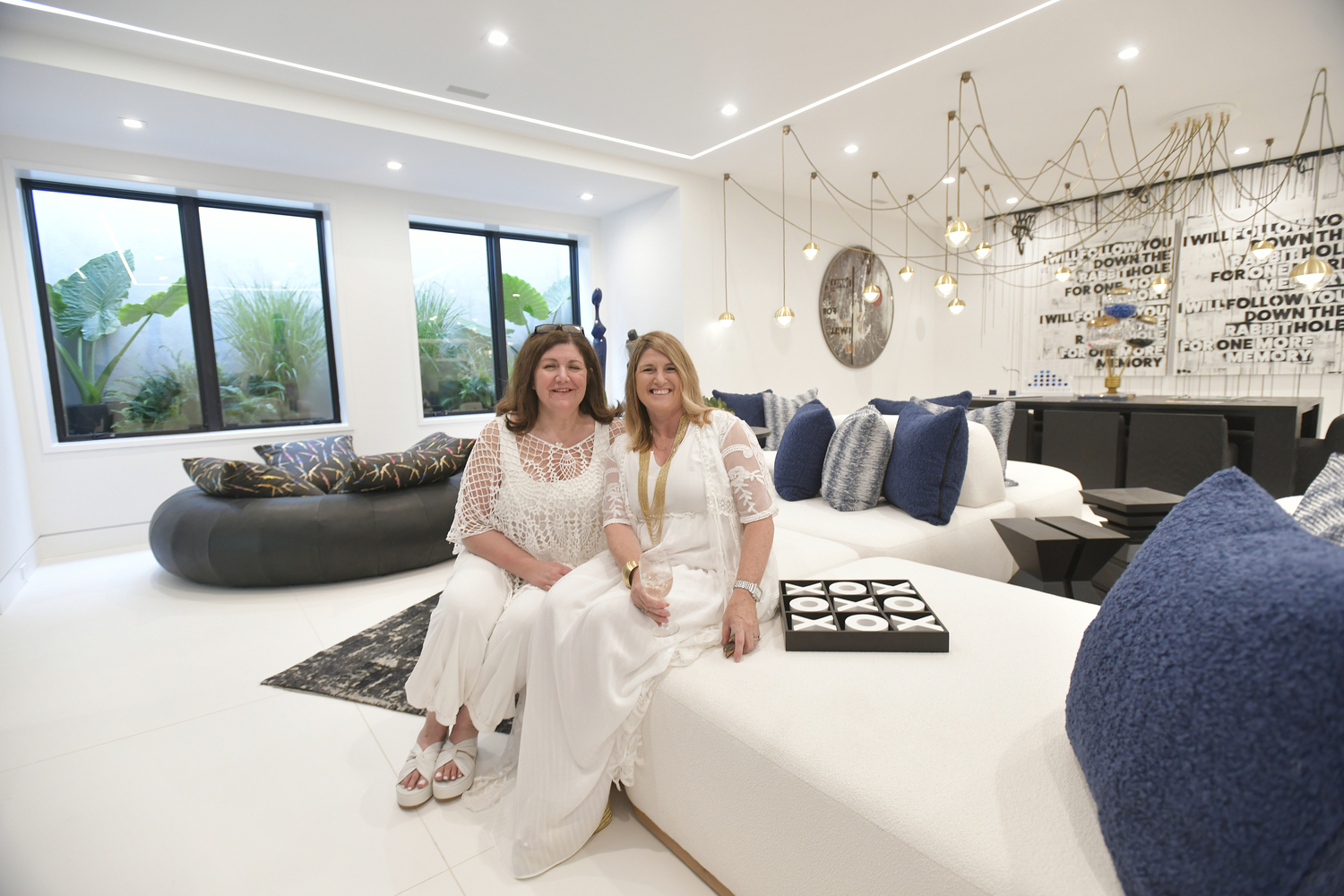 Melissa Fenigstein and Karin Krinski of New Age Interiors in the downstairs lounge.   DANA SHAW