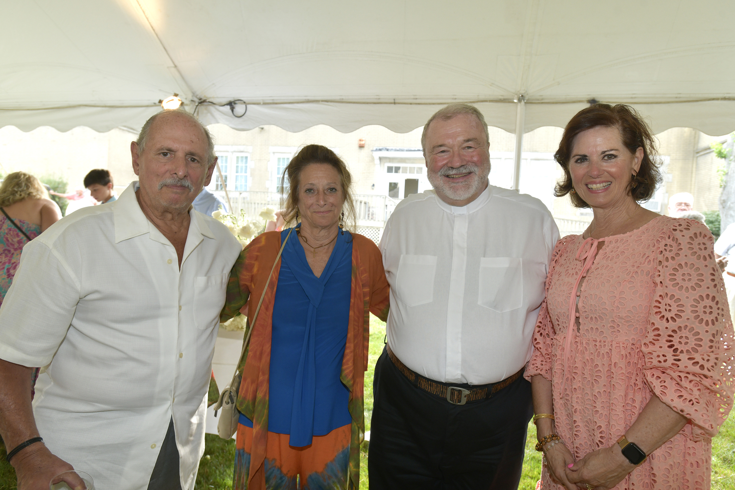 Paul and Laurie DeRobertis, Father Michael Vetrano and Gina Arresta.