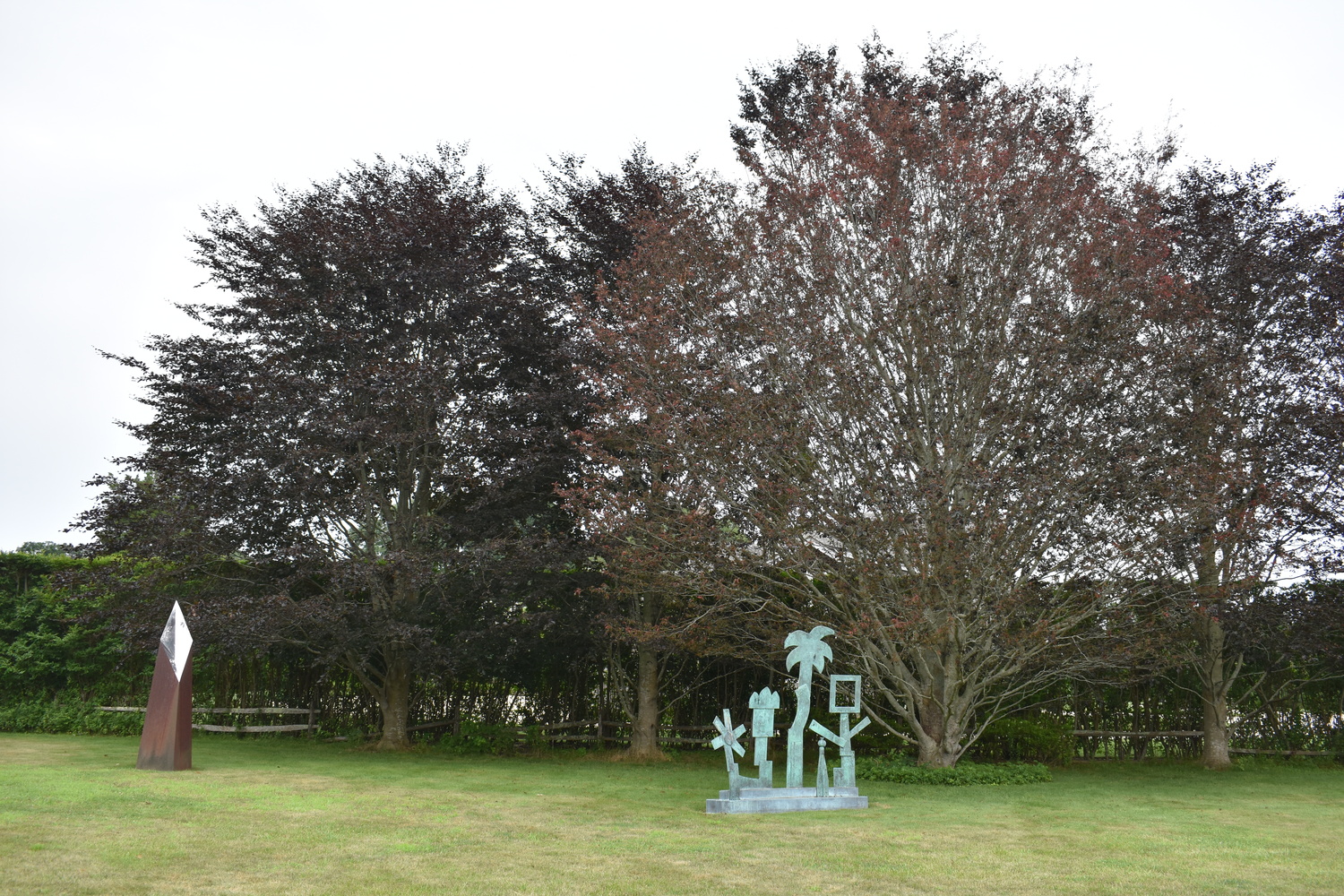 Louis Meisel with his beech trees in his sculpture garden in Sagaponack.  BRENDAN J. O'REILLY