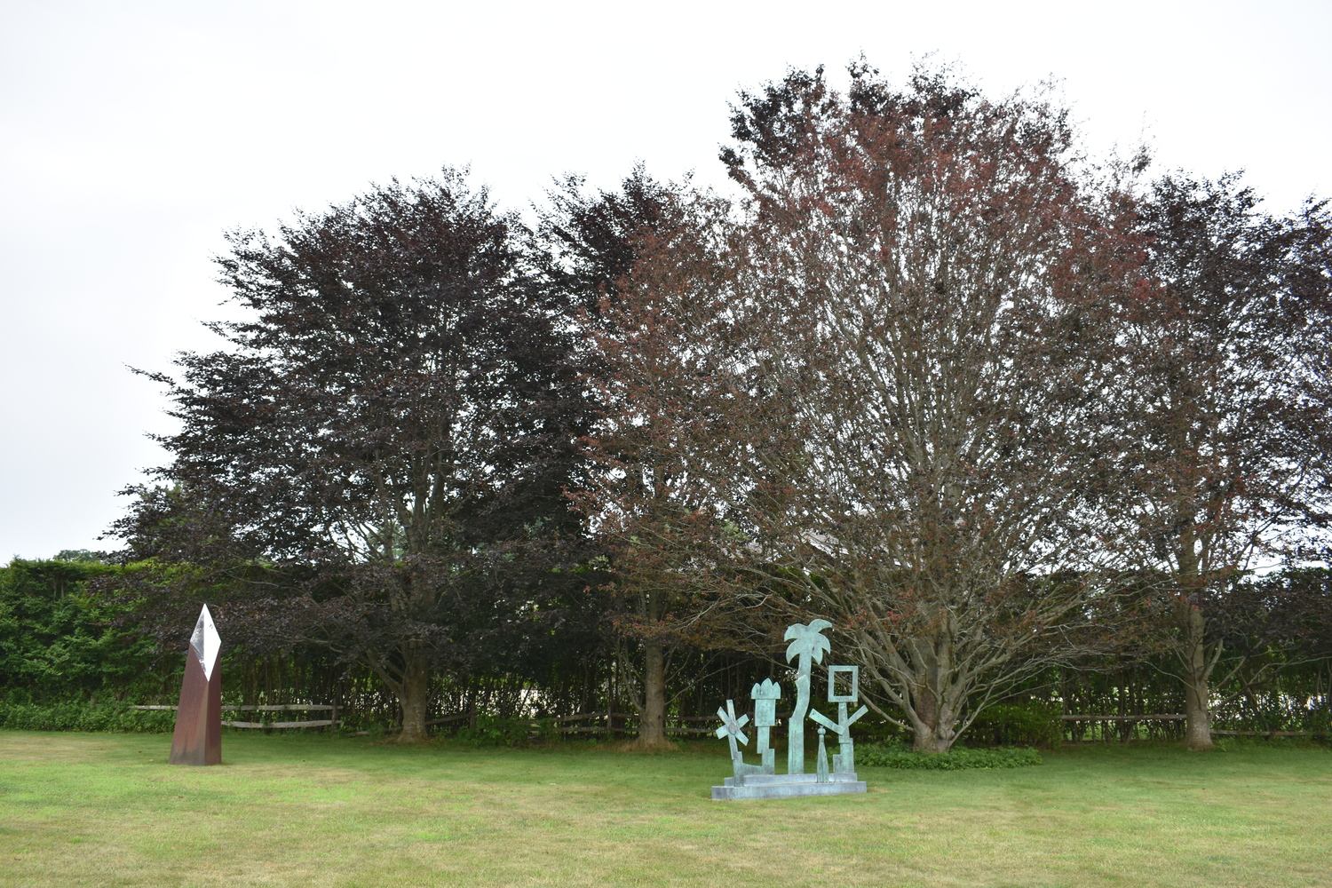 Louis Meisel with his beech trees in his sculpture garden in Sagaponack.  BRENDAN J. O'REILLY