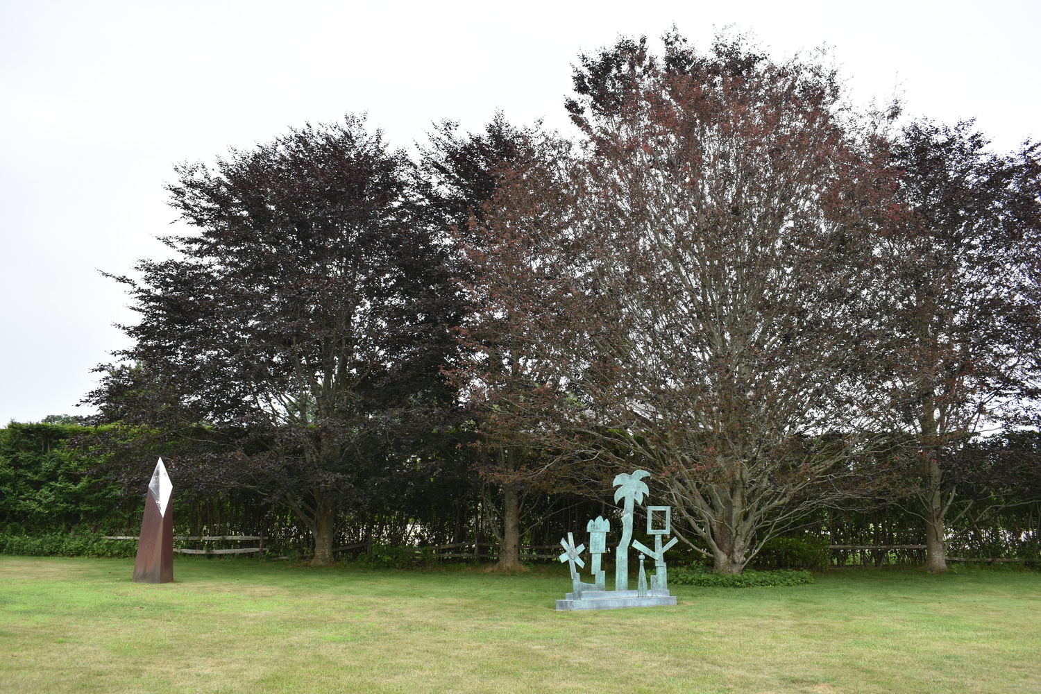 Louis Meisel with his beech trees in his sculpture garden in Sagaponack.  BRENDAN J. O'REILLY