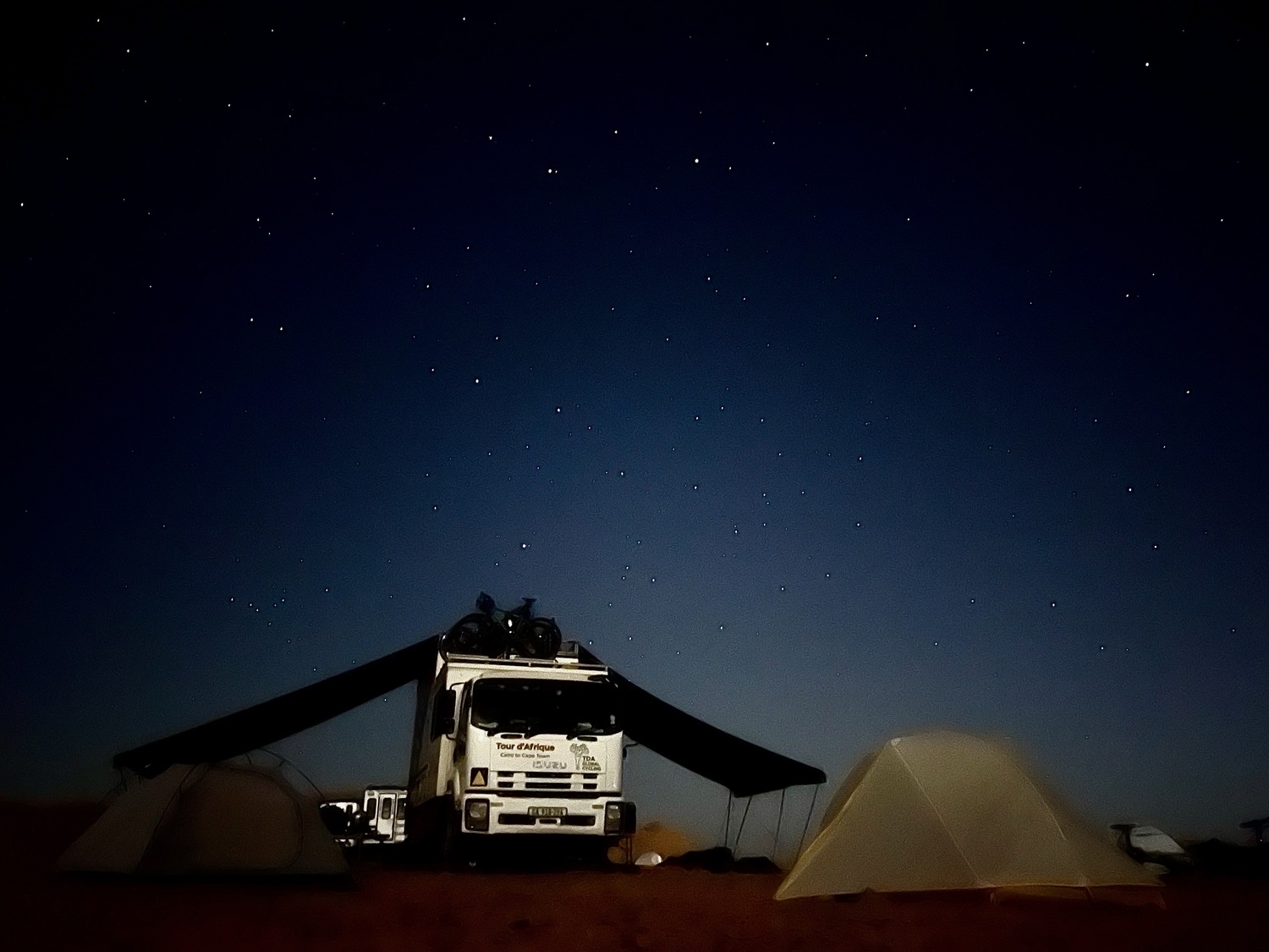 A desert camp in Sudan. COURTESY JOE LOUCHHEIM