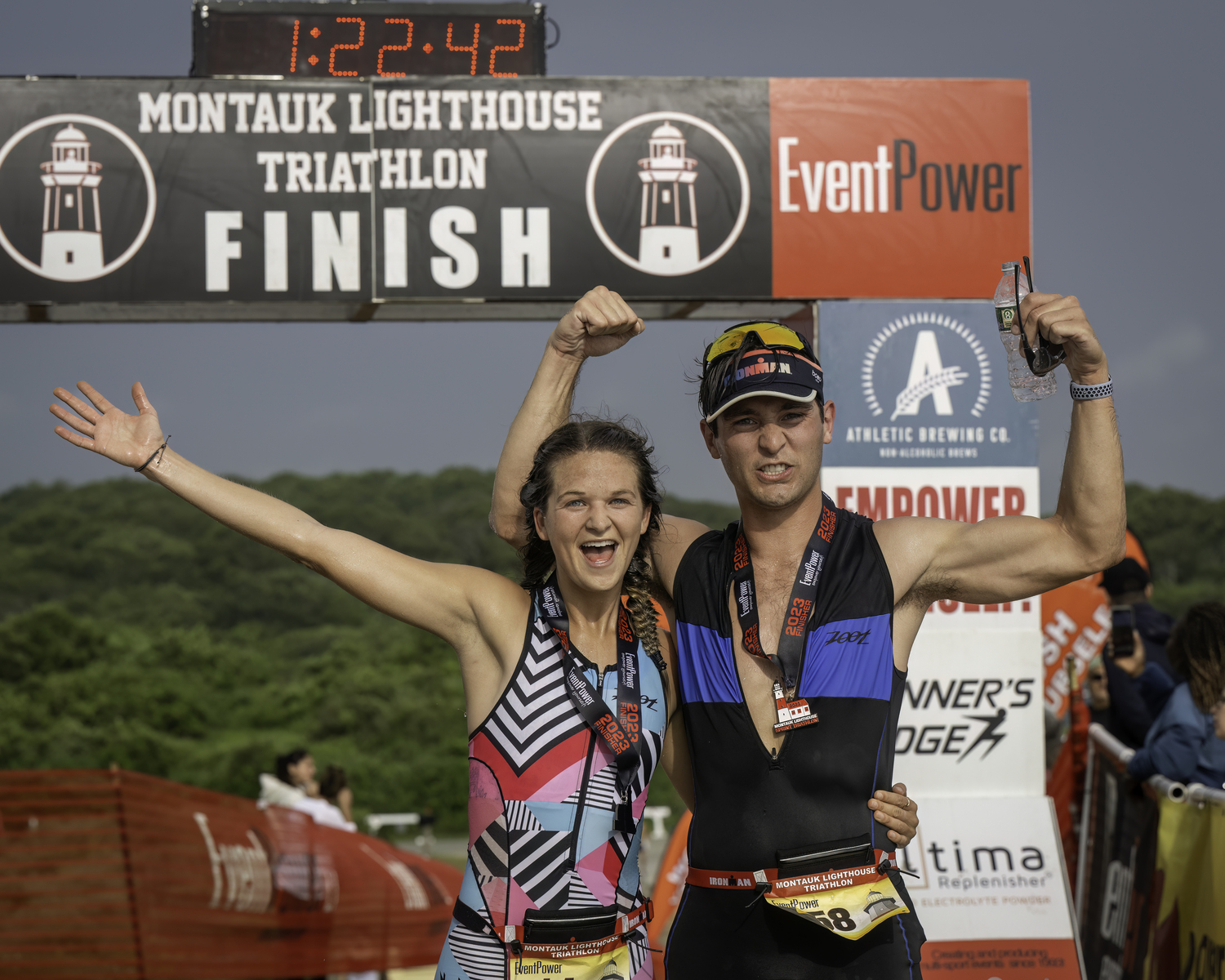 Katrina Garry with a friend at the finish line.   MARIANNE BARNETT