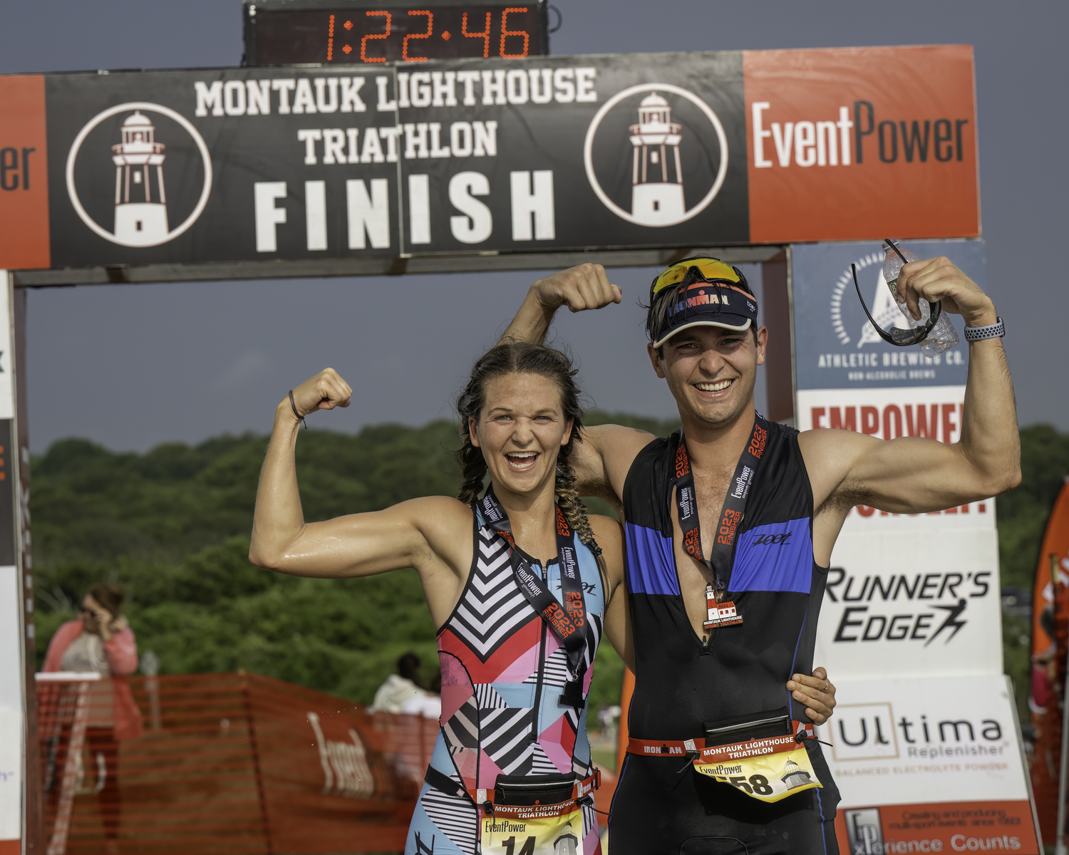 Katrina Garry with a friend at the finish line.   MARIANNE BARNETT