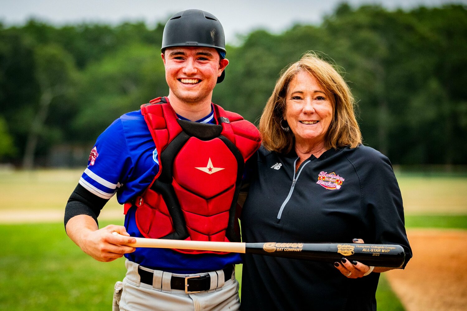 Southampton Breaker Ty Gilligan (Dominican) with HCBL President Sandi Kruel. Gilligan was selected as this year's HCBL All-Star Game MVP after hitting a game-tying two-run home run in the top of the ninth inning of Saturday's game.   DEMETRIUS KAZANAS