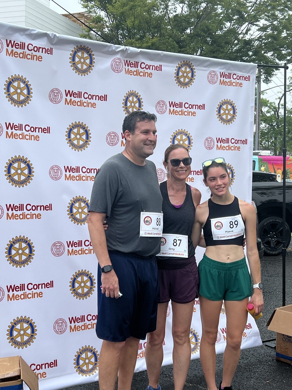 The Going family, Michael, left, Amy and Maeve. Michael and Amy met 25 years ago at the seventh annual Firecracker 8K and returned on Sunday morning with their 15-year-old daughter Maeve.    KEVIN LUSS