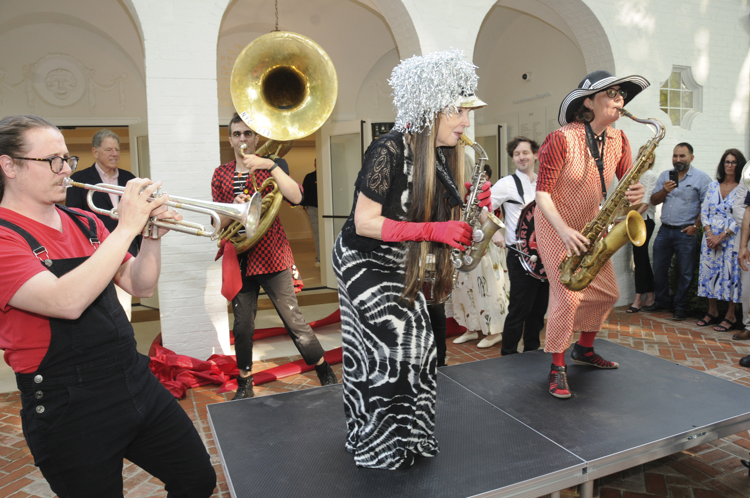 The Hungry March Band performs.