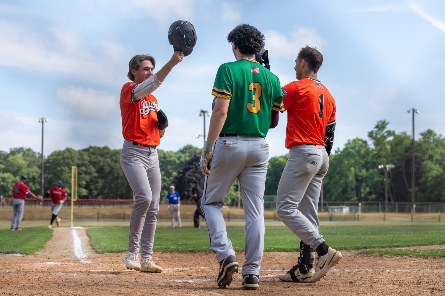 Red Team All-Stars welcome each other at home plate after Westhampton Aviator Ethan Guerra's three-run home run put them up, 7-0, in the second inning.   RON ESPOSITO