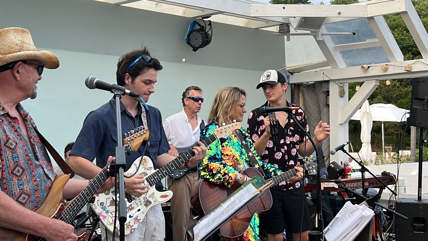 Nancy Atlas and her band on stage at The Surf Lodge in Montauk performing with her son, Cashus Muse. Both will perform at a July 22 concert in Sag Harbor. ELLEN DIOGUARDI