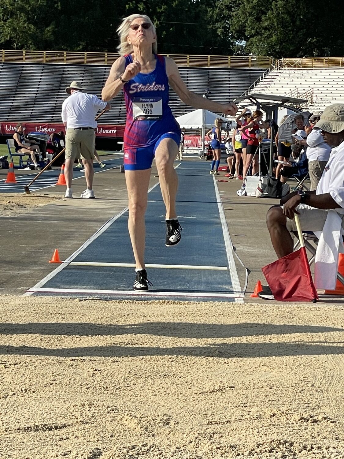 Joy Flynn launches a winning long jump at the Masters Nationals in Greensboro, North Carolina.