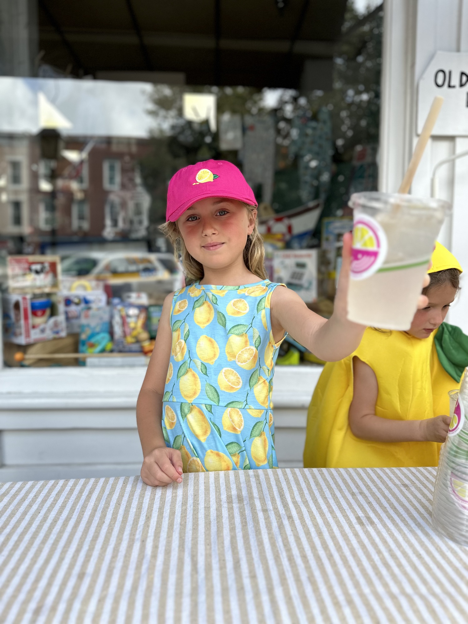 Fiona and Maeave used compostible cups and bamboo straws for their fresh-squeezed lemonade.