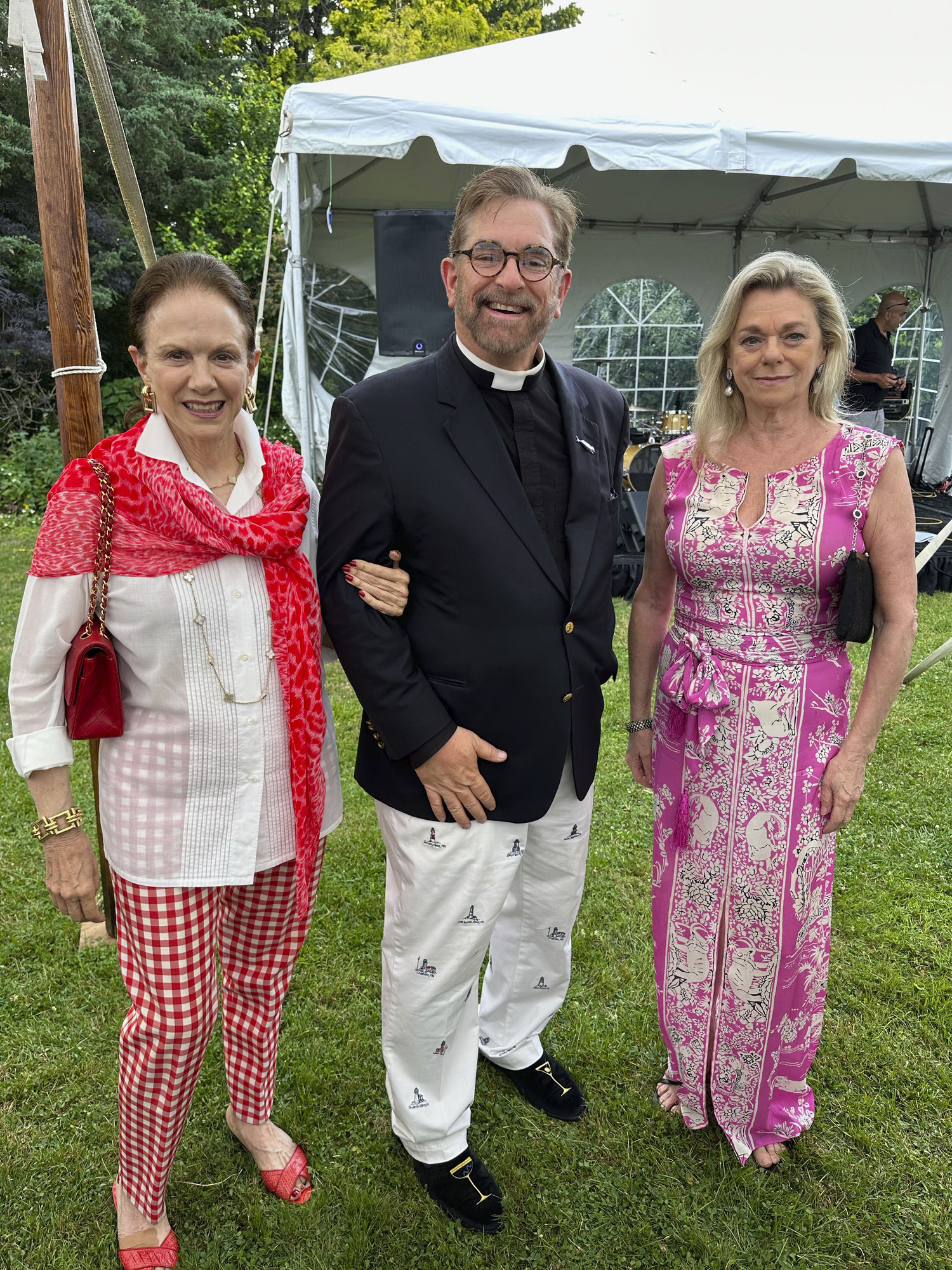 Sandra McConnell, Father Patrick Edwards and Debbie Bancroft.