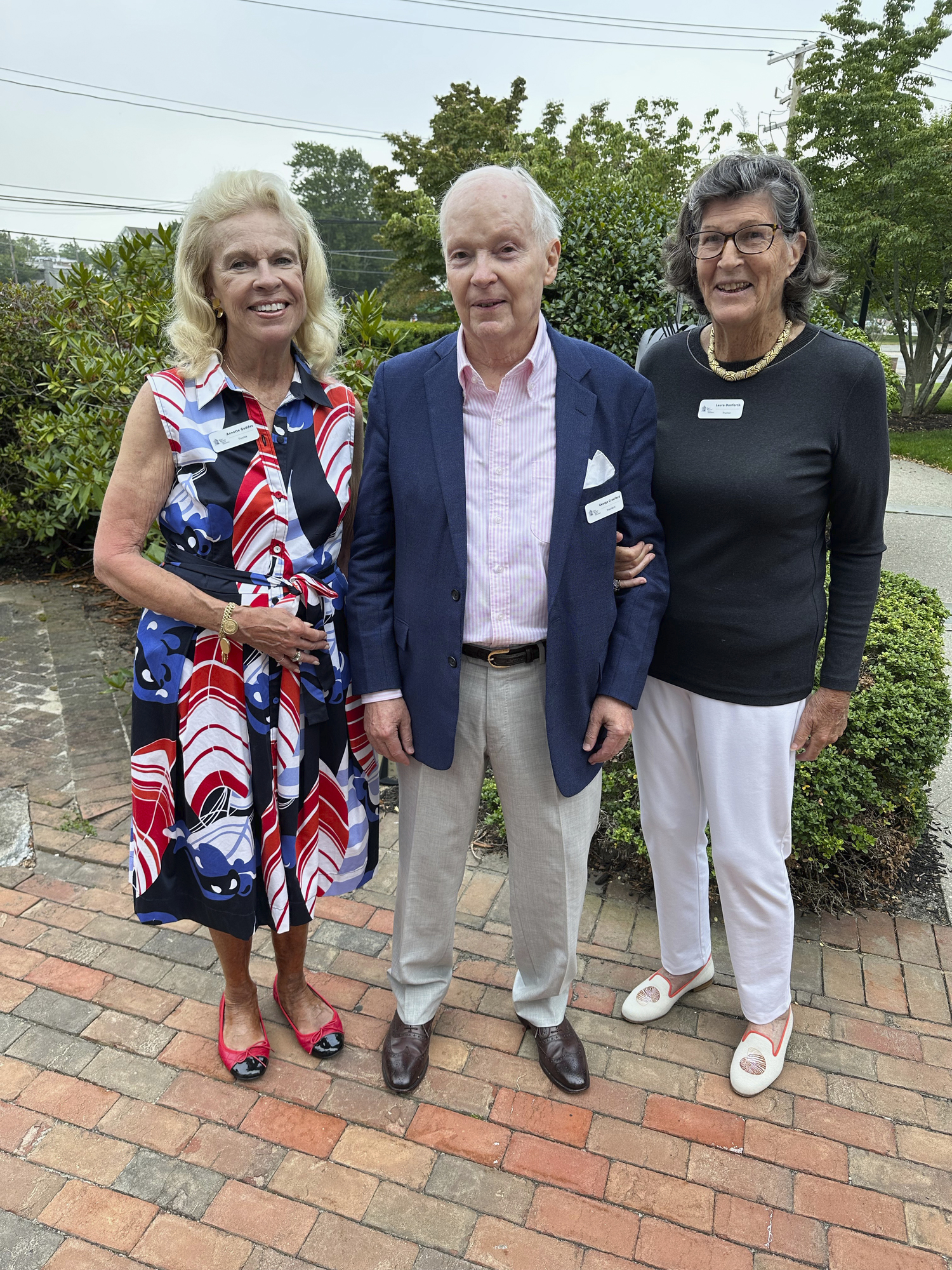 Foundation Board members Annette Geddes, George Crawford and Laura Danforth at The Rogers memorial Library Cabaret Night. GREG D'ELIA