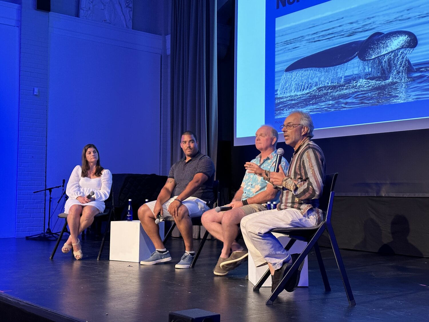 Sharp, Weeks, Martin and Safina discussing right whales on stage.