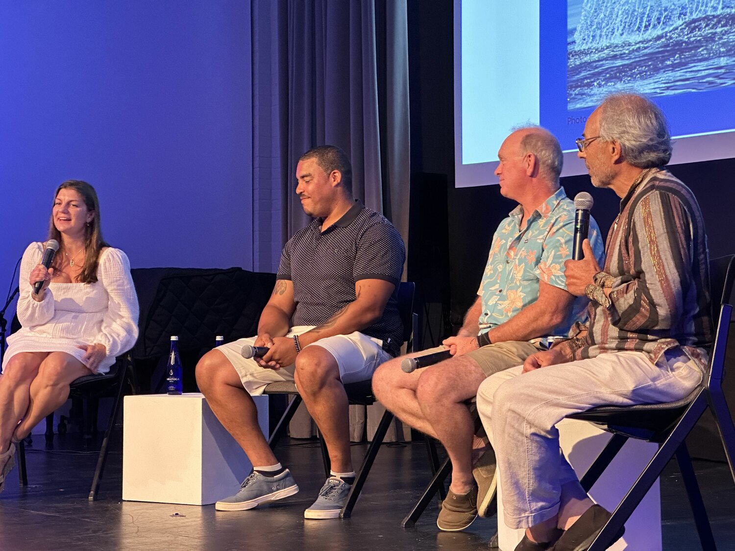 Sharp, Weeks, Martin and Safina discussing right whales on stage.