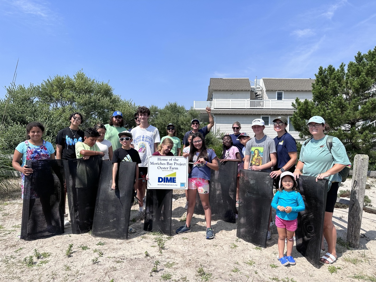 Volunteers and coordinators pose for a photo. JOHN PAUL FERANTINO