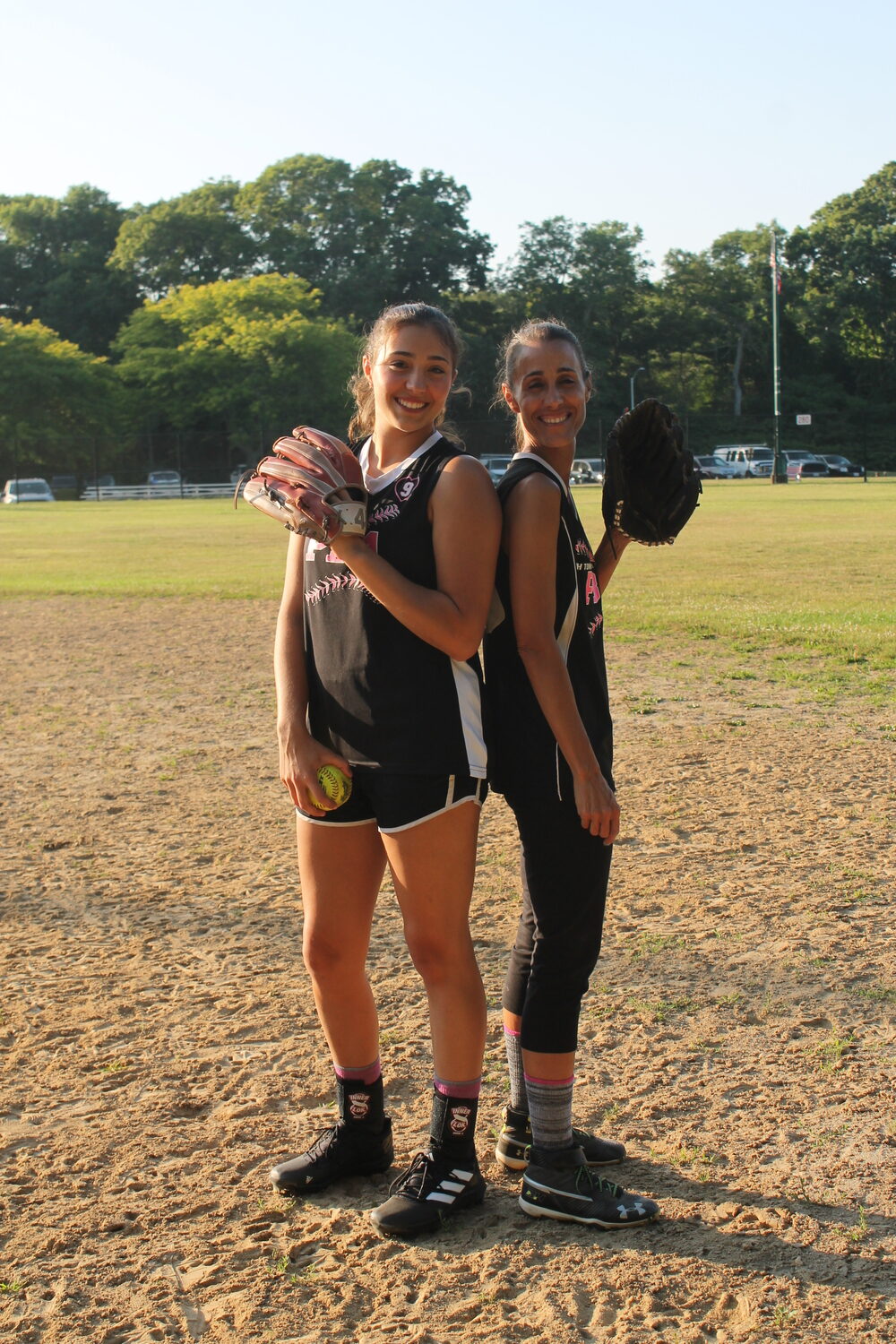 Emma and Julie Terry now play on the East Hampton PBA women's softball team together.   JEN VINSKI