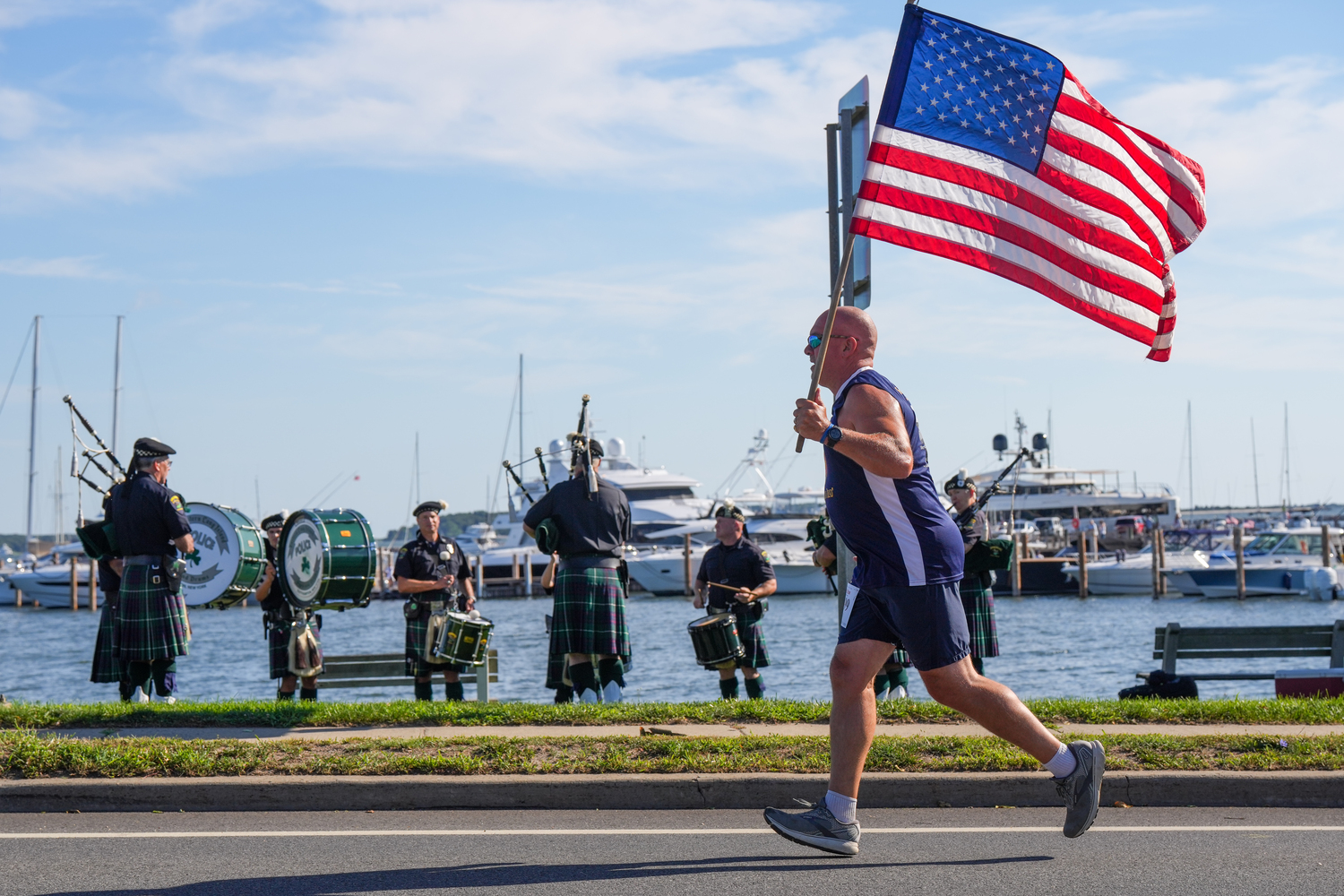 Michael Davis carries the flag.   RON ESPOSITO