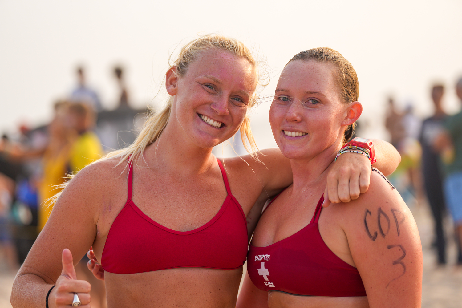 Fire Island lifeguard Kiersten DeCamp, left, and Southampton lifeguard Evie Purcell at the Main Beach Lifeguard Tournament on Thursday, July 27.   RON ESPOSITO