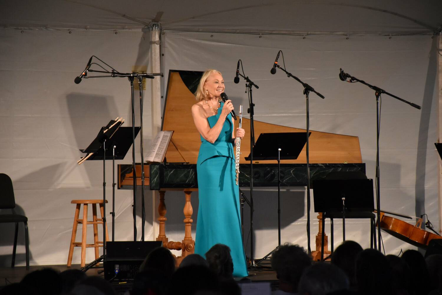 Marya Martin, founder of the Bridgehampton Chamber Music Festival, speaks at the 2022 Wm. Brian Little Concert at Channing Daughters Sculpture Garden. MICHAEL LAWRENCE