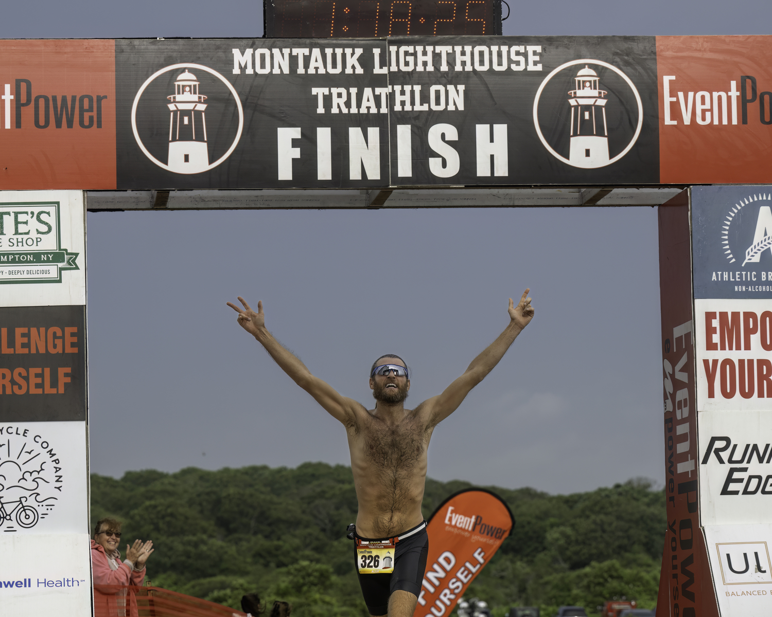 Alex Olt finishes the Montauk Lighthouse Triathlon on Sunday.  MARIANNE BARNETT