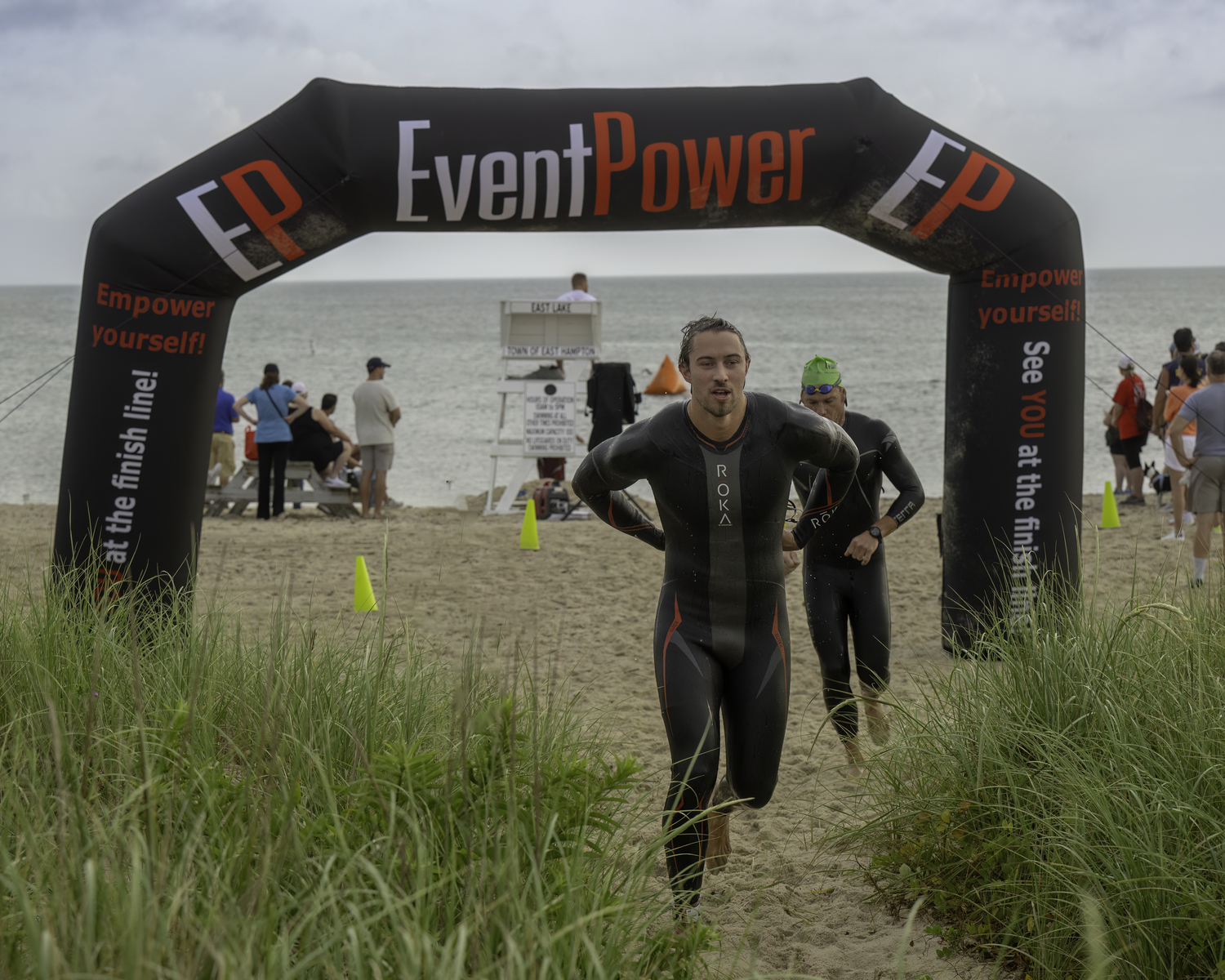 Heading out of the water of the swim portion of the Montauk Lighthouse Triathlon.   MARIANNE BARNETT