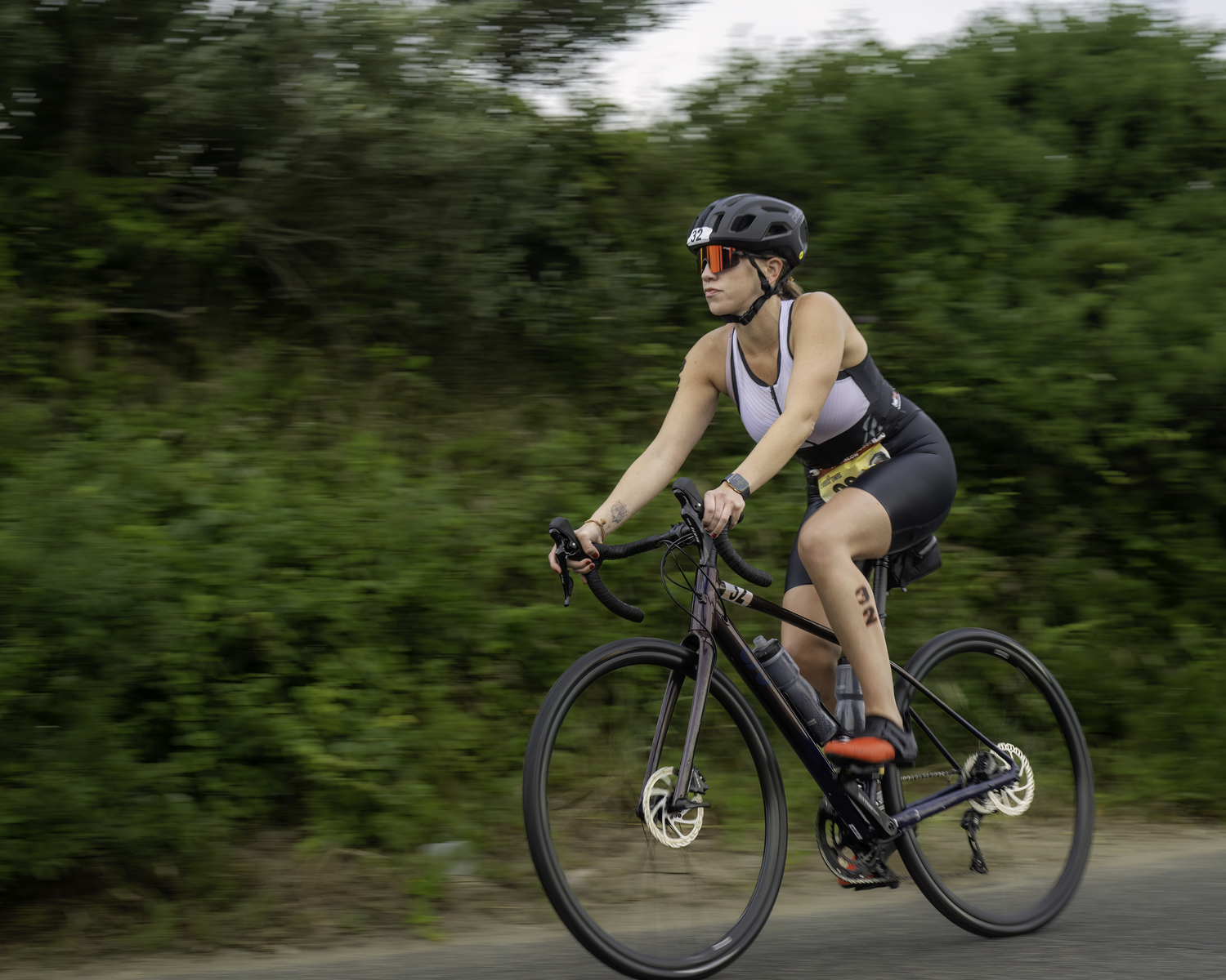 Emma Dienst in the bike portion of Sunday's triathlon.   MARIANNE BARNETT