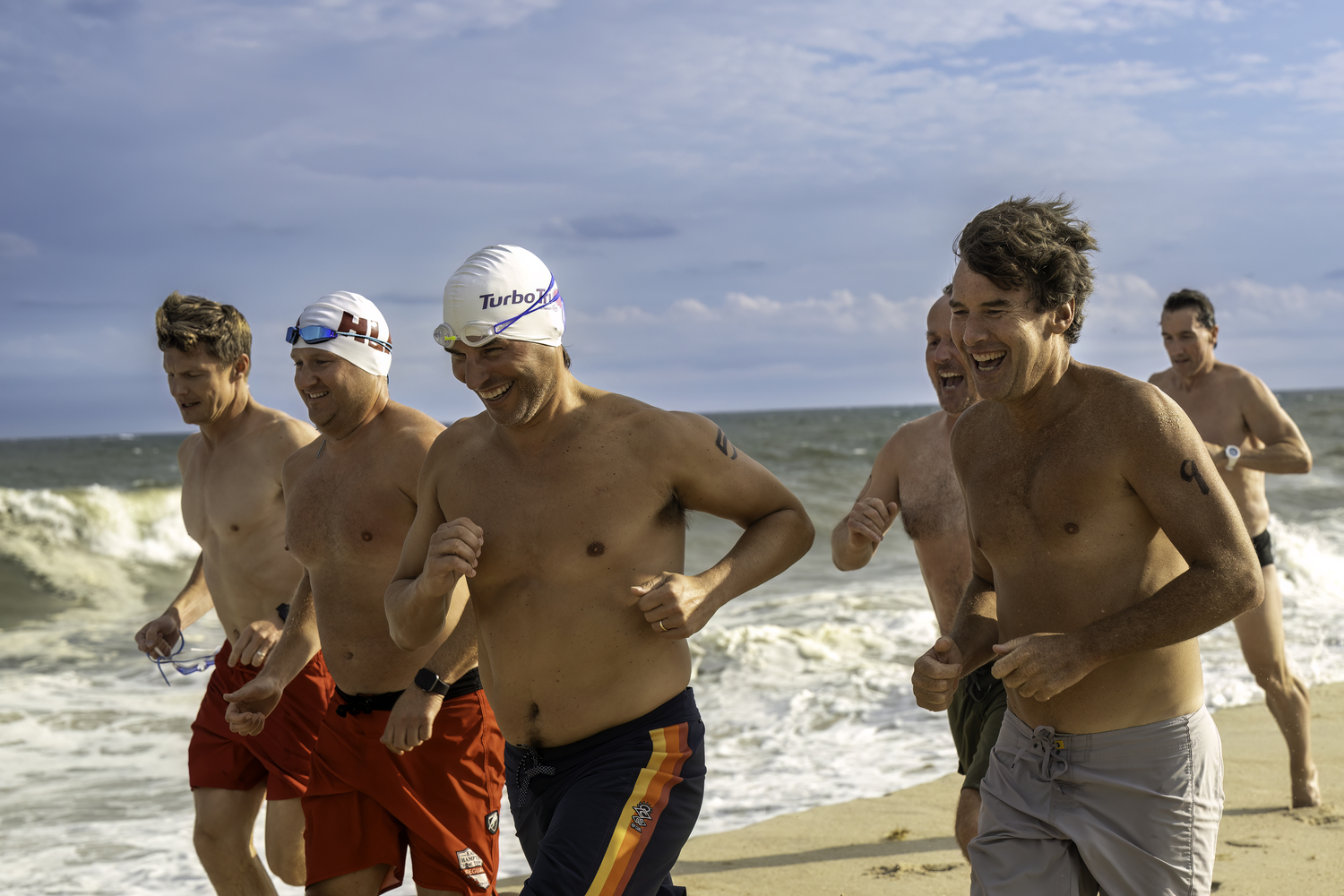 The Hampton Lifeguard Association held its second annual Run-Swim-Run on Friday at Atlantic Avenue Beach in Amagansett to help defray the cost of its lifeguards heading to the USLA Nationals next month.    MARIANNE BARNETT